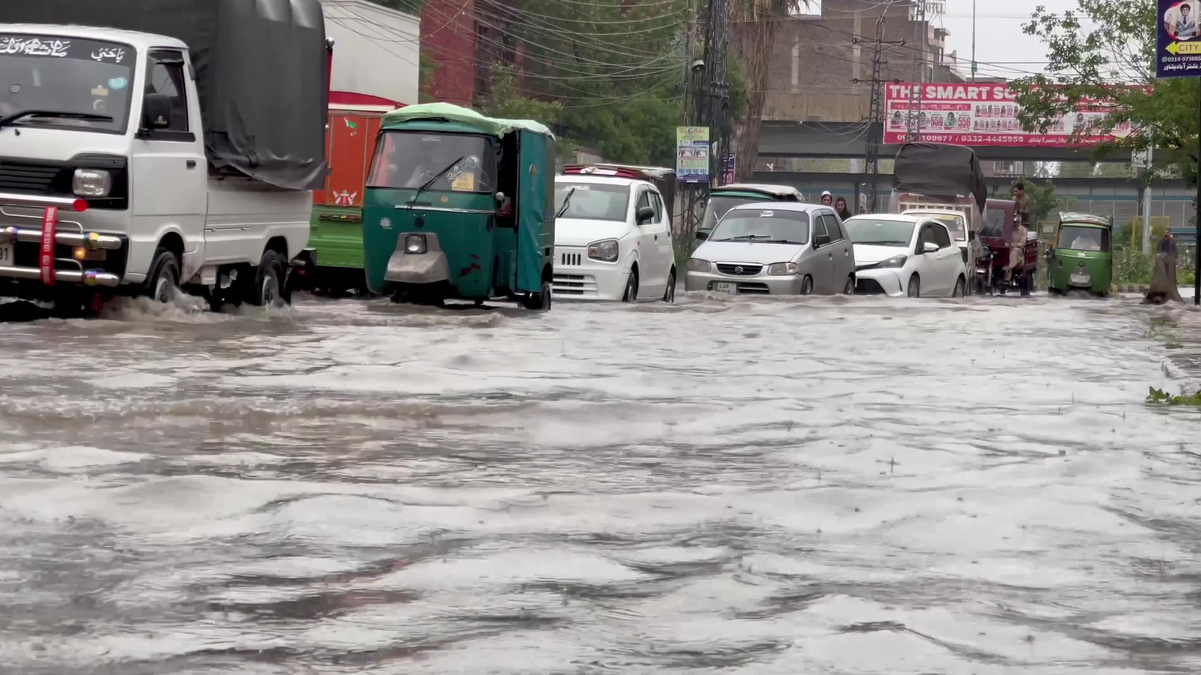 Flooded Streets in Peshawar After Heavy Rains Leave Dozens Dead