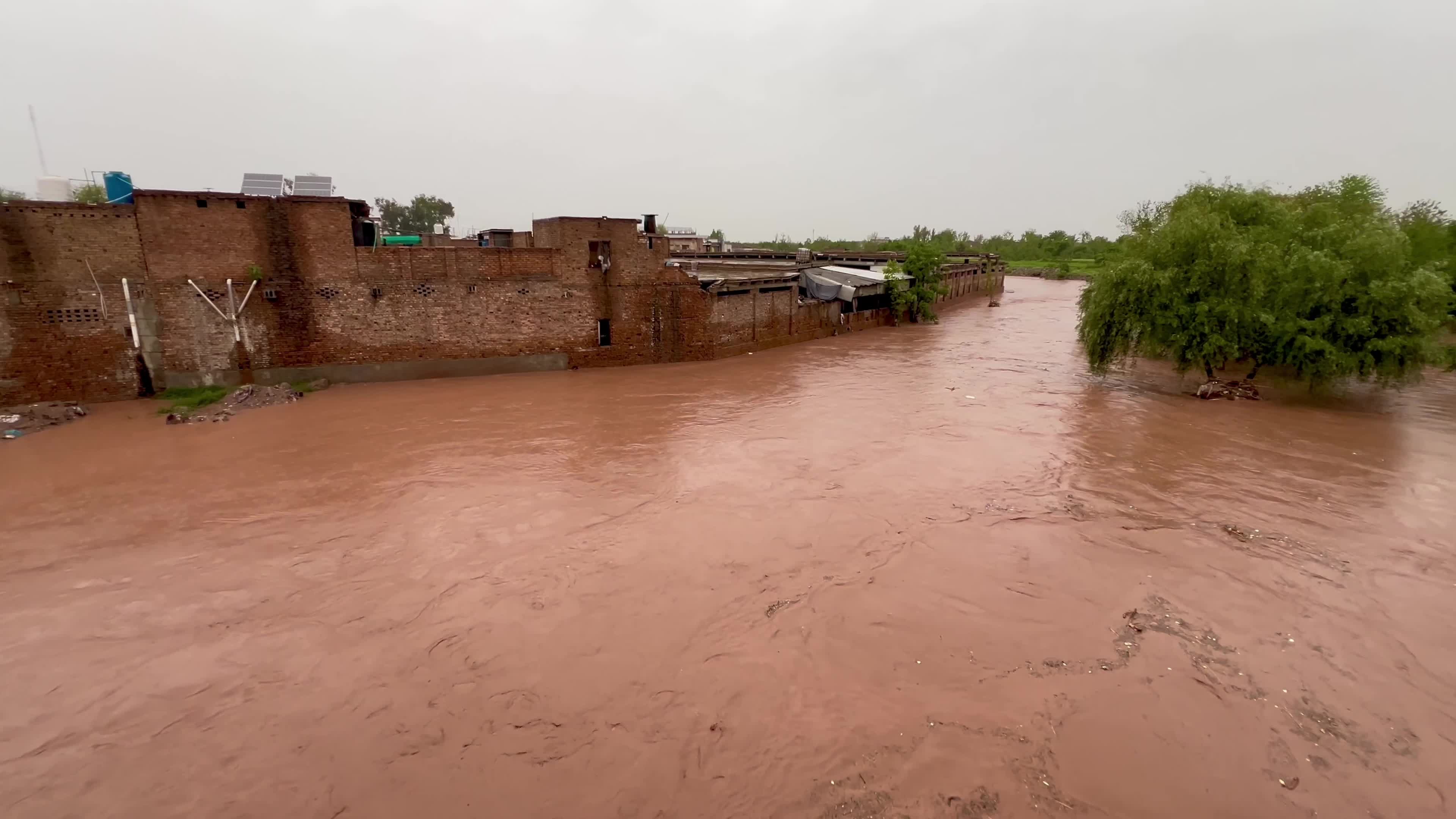 Flooded Streets in Peshawar After Heavy Rains Leave Dozens Dead
