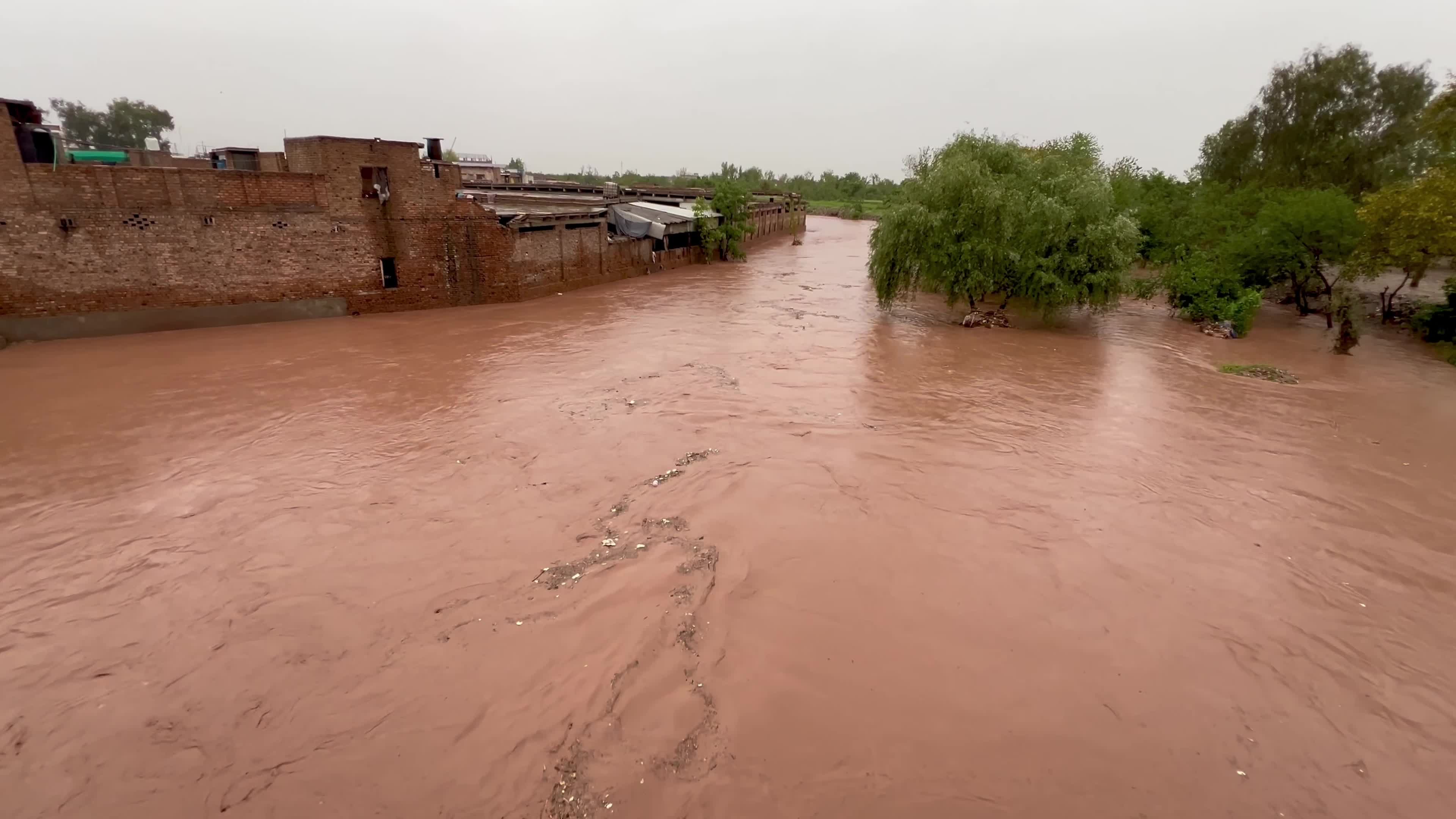 Flooded Streets in Peshawar After Heavy Rains Leave Dozens Dead