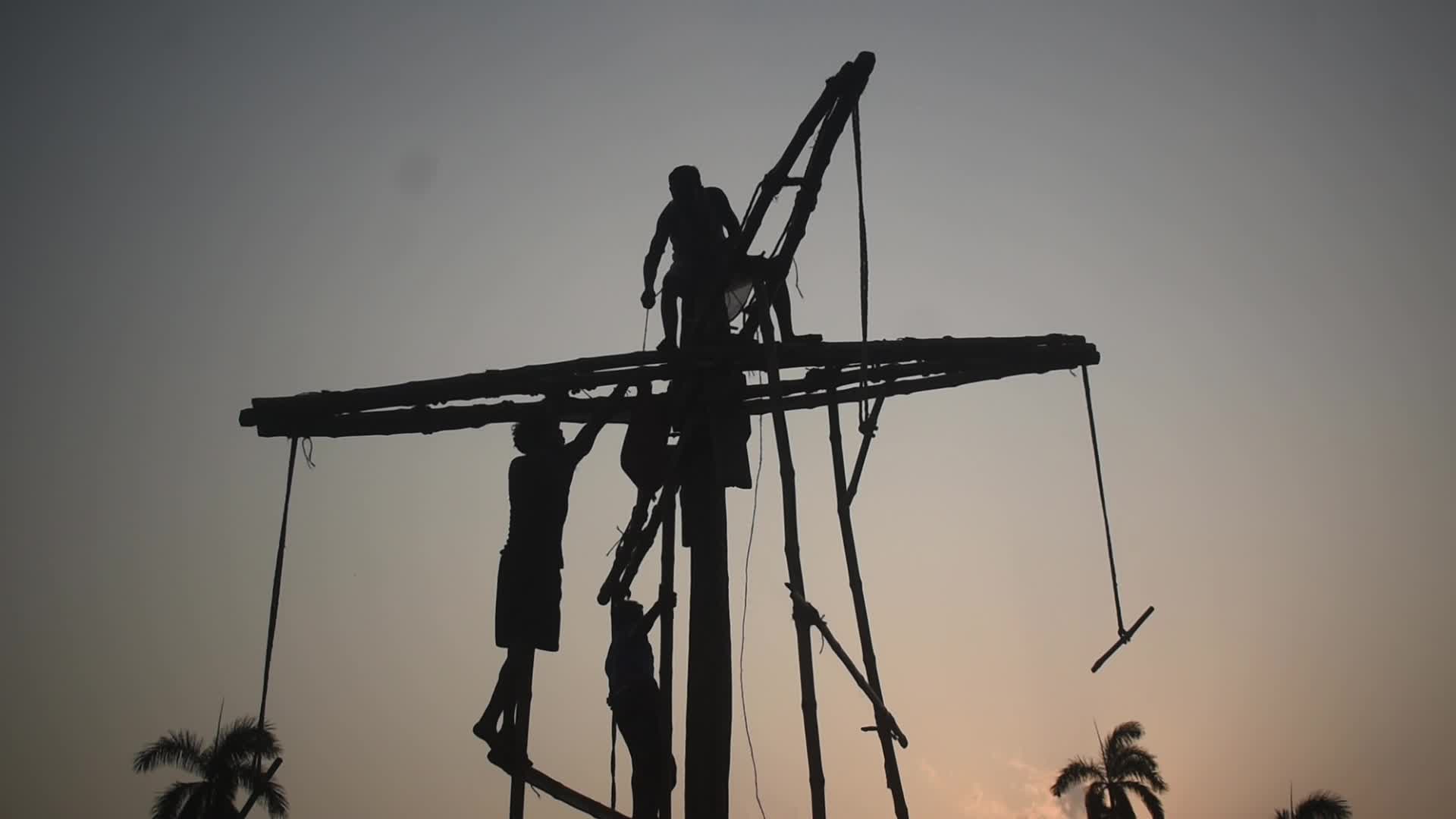 Devotees perform Charak Puja rituals on the outskirts of Kolkata