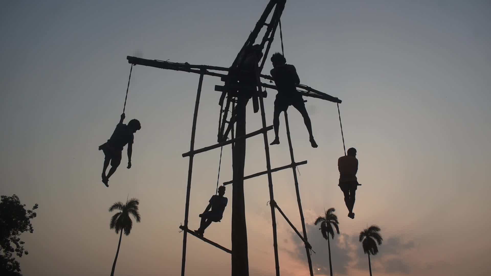Devotees perform Charak Puja rituals on the outskirts of Kolkata