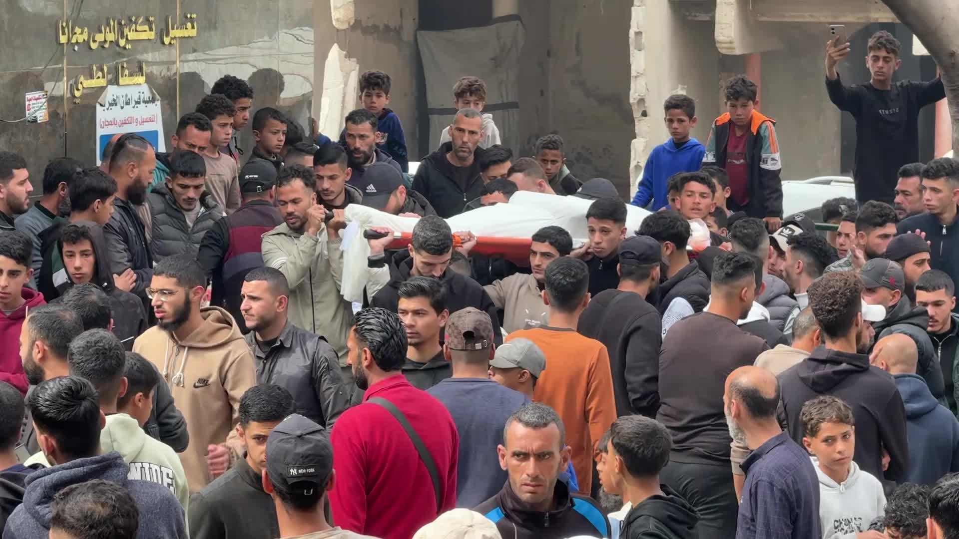 Mourners gather at Al Shifa Hospital after deadly overnight strike in Gaza City