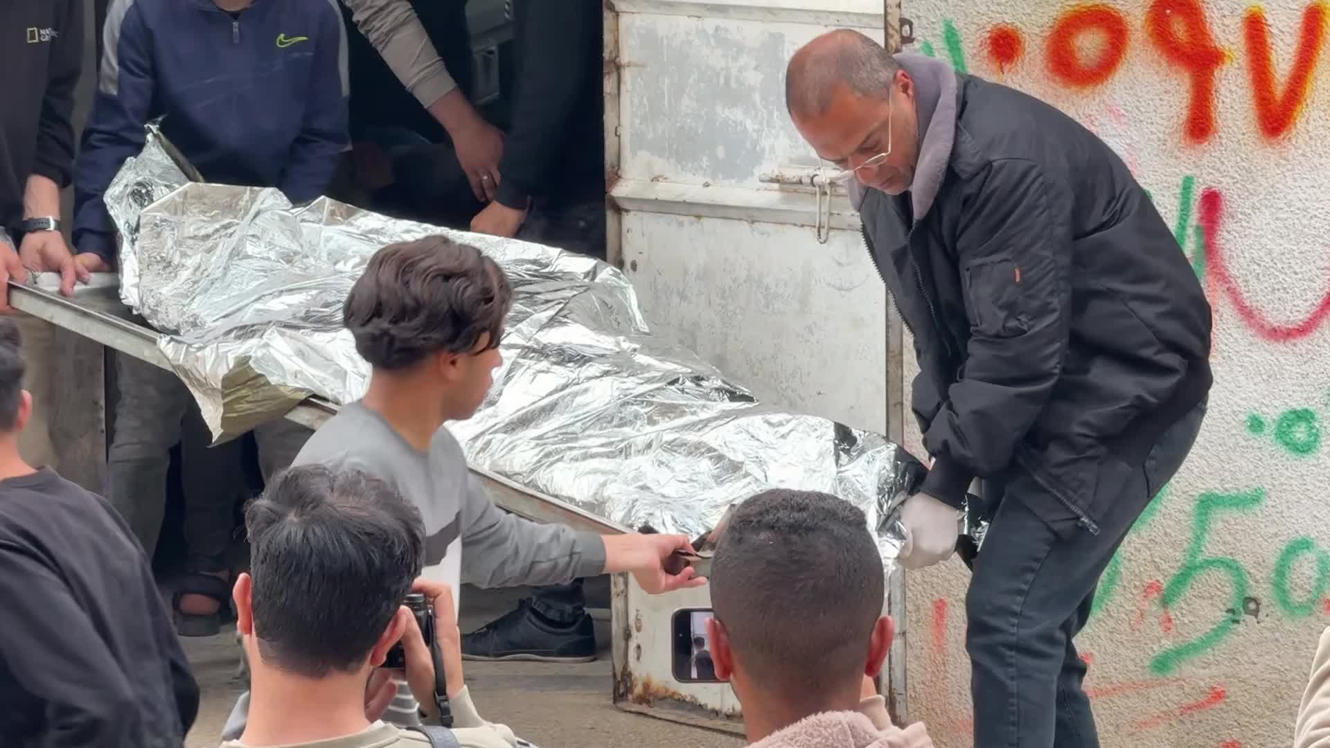 Mourners gather at Al Shifa Hospital after deadly overnight strike in Gaza City