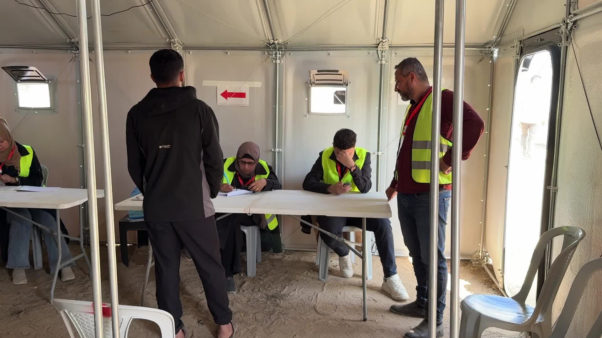 Palestinians vote during the municipal election at a polling station in Deir al-Balah