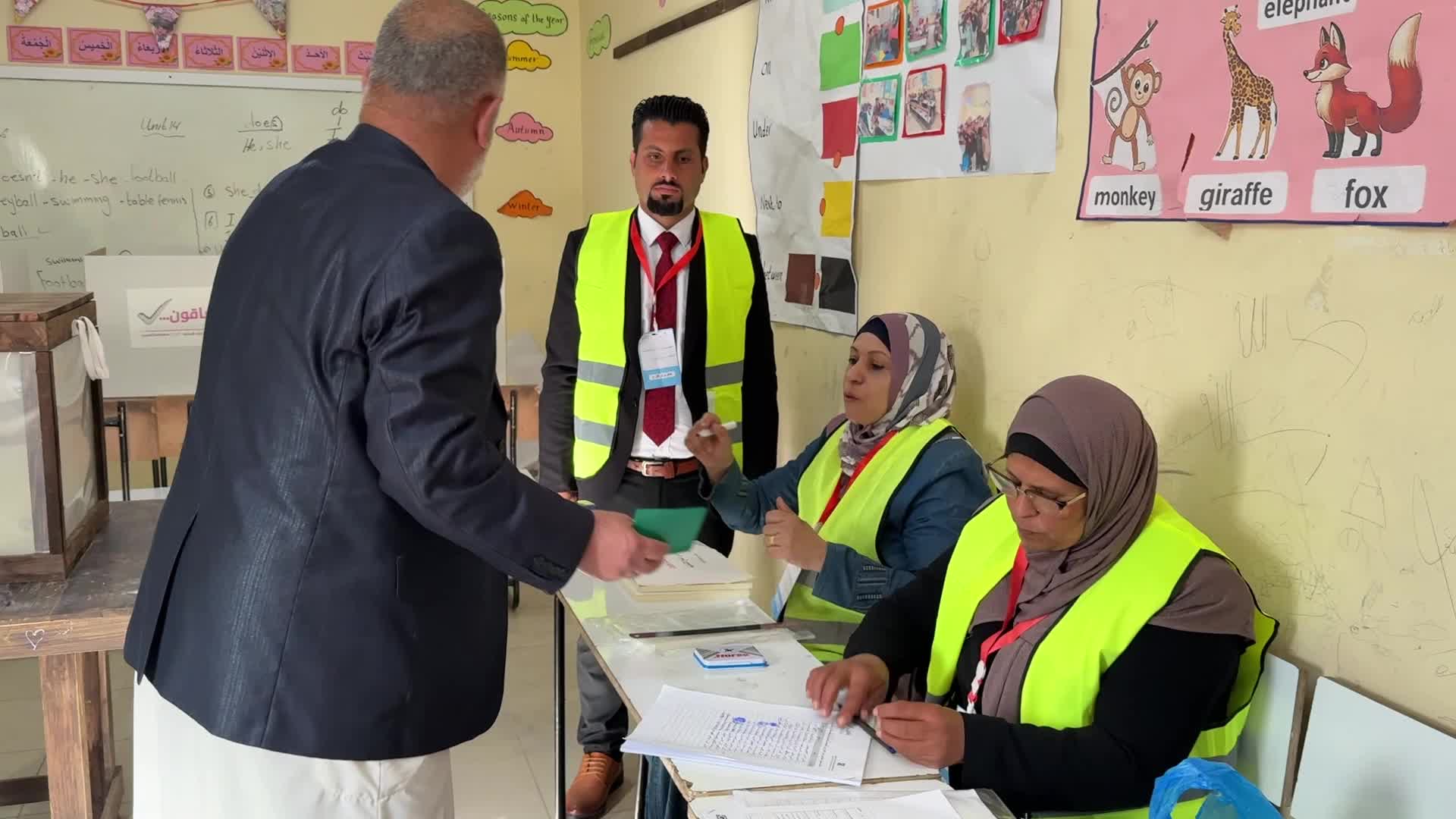 Palestinians vote during the municipal election at a polling station in Deir al-Balah