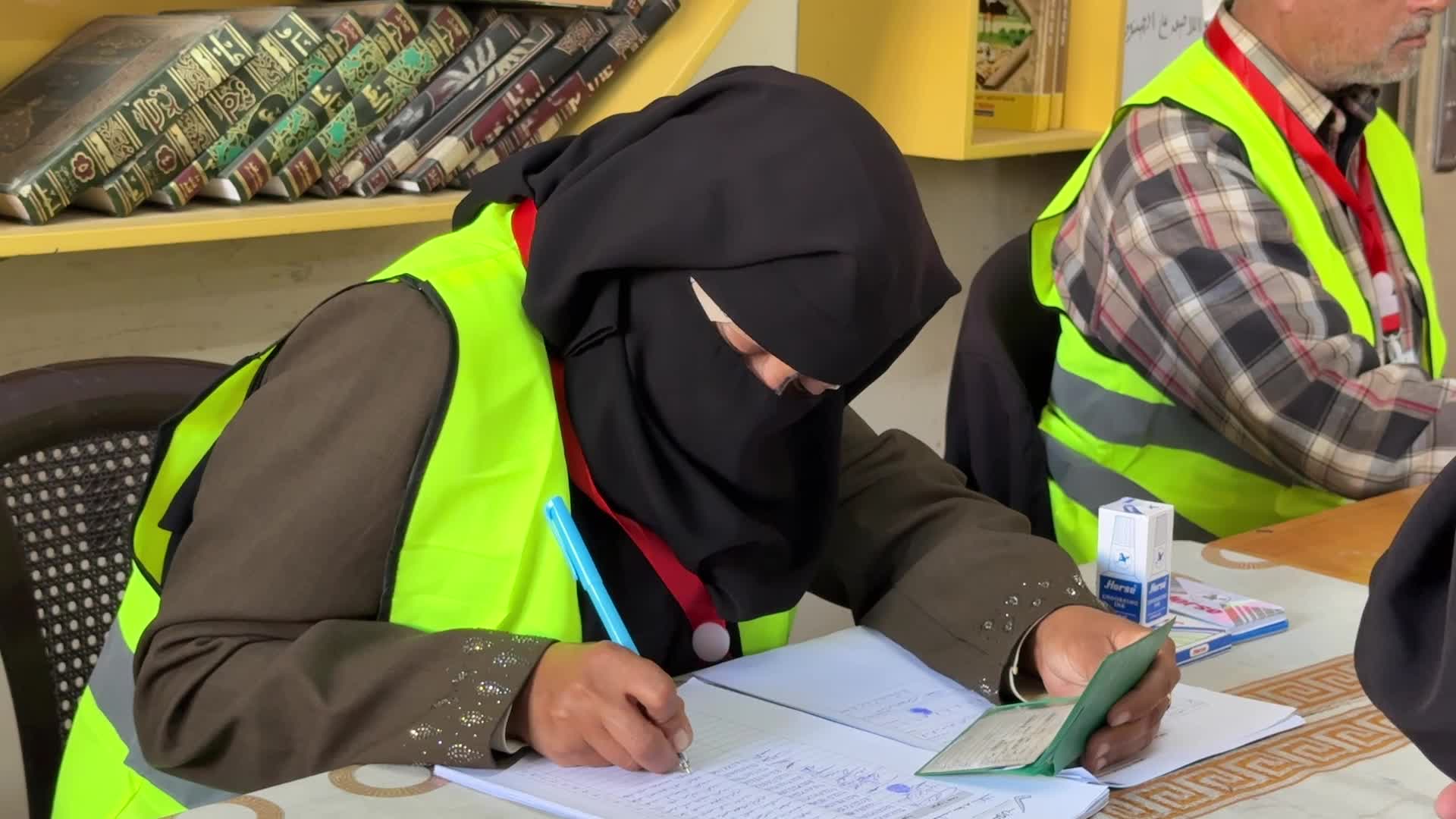 Palestinians vote during the municipal election at a polling station in Deir al-Balah