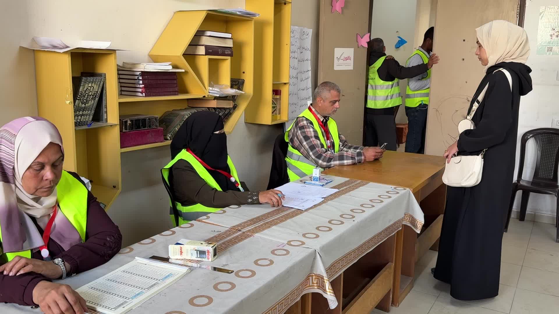 Palestinians vote during the municipal election at a polling station in Deir al-Balah