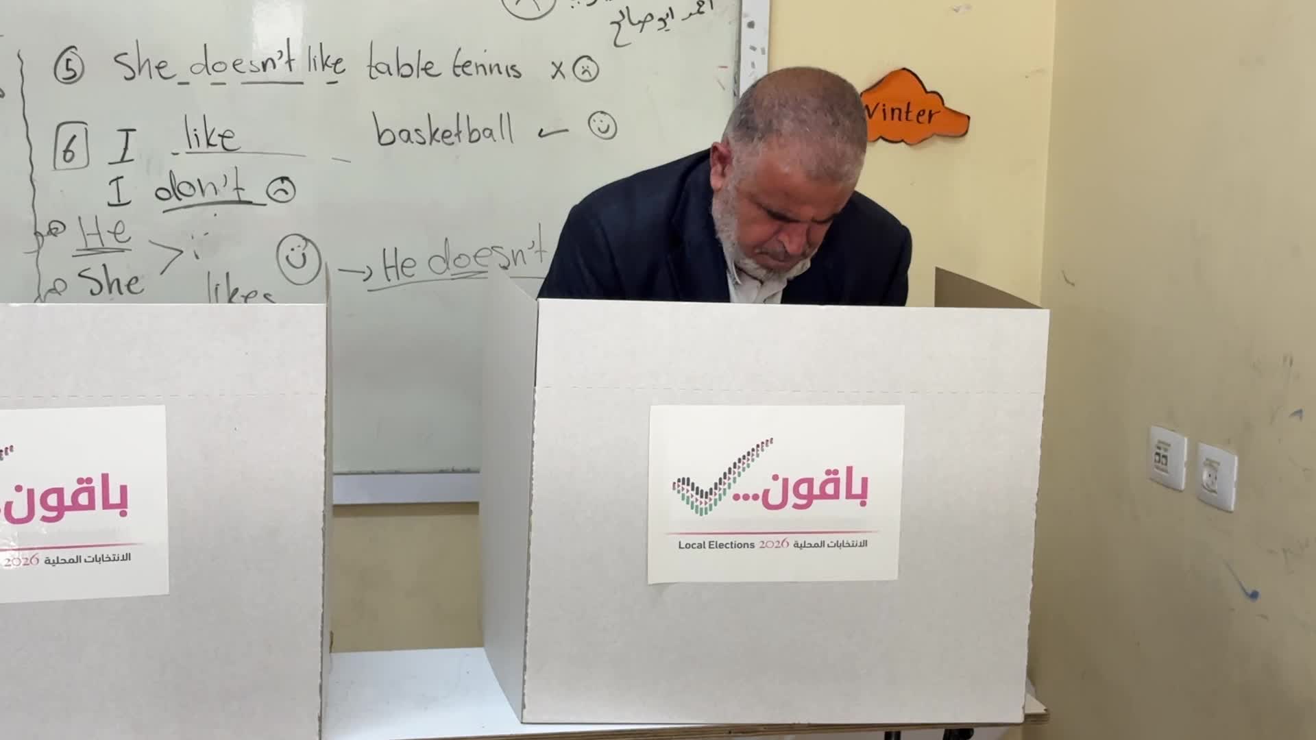 Palestinians vote during the municipal election at a polling station in Deir al-Balah