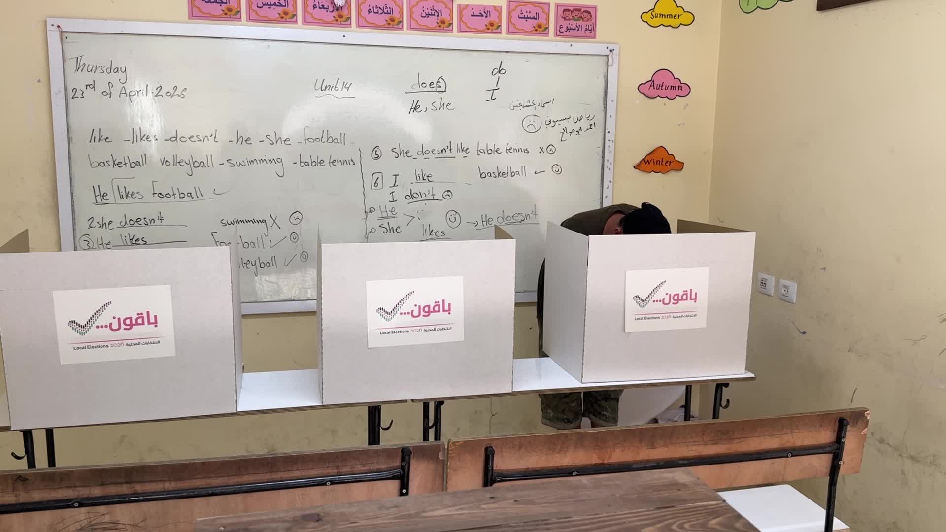 Palestinians vote during the municipal election at a polling station in Deir al-Balah