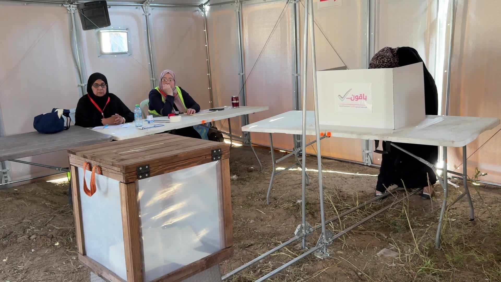 Palestinians vote during the municipal election at a polling station in Deir al-Balah - 04/25/2026