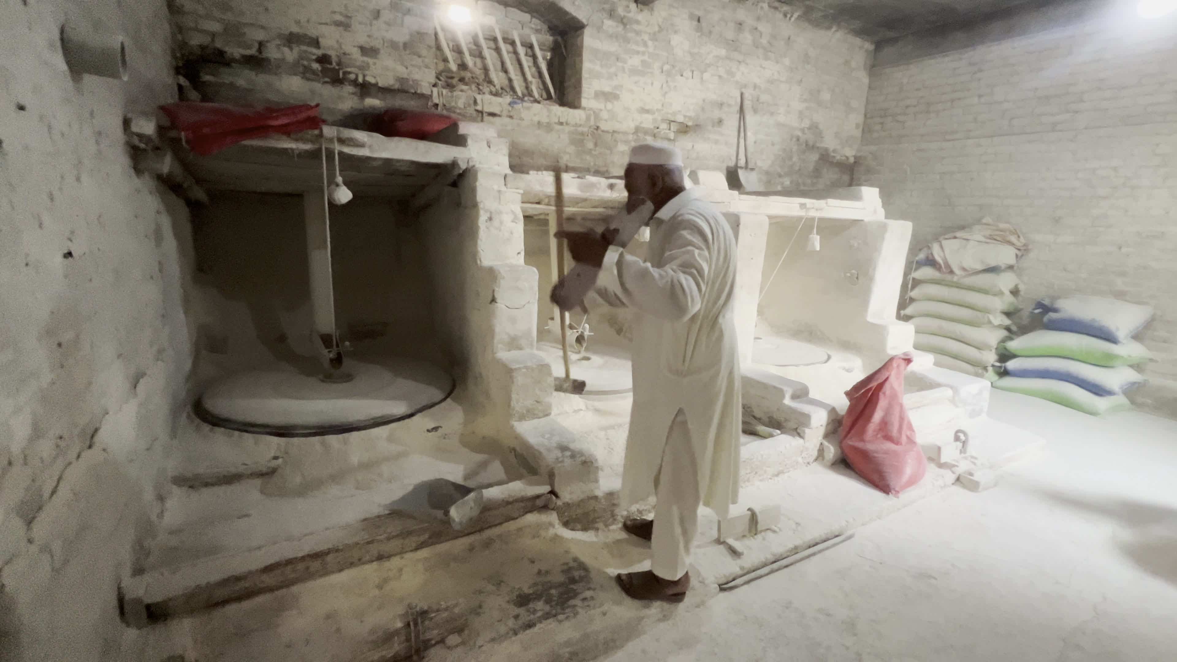 Traditional Watermill Still Turns Along Kabul River Canal in Peshawar
