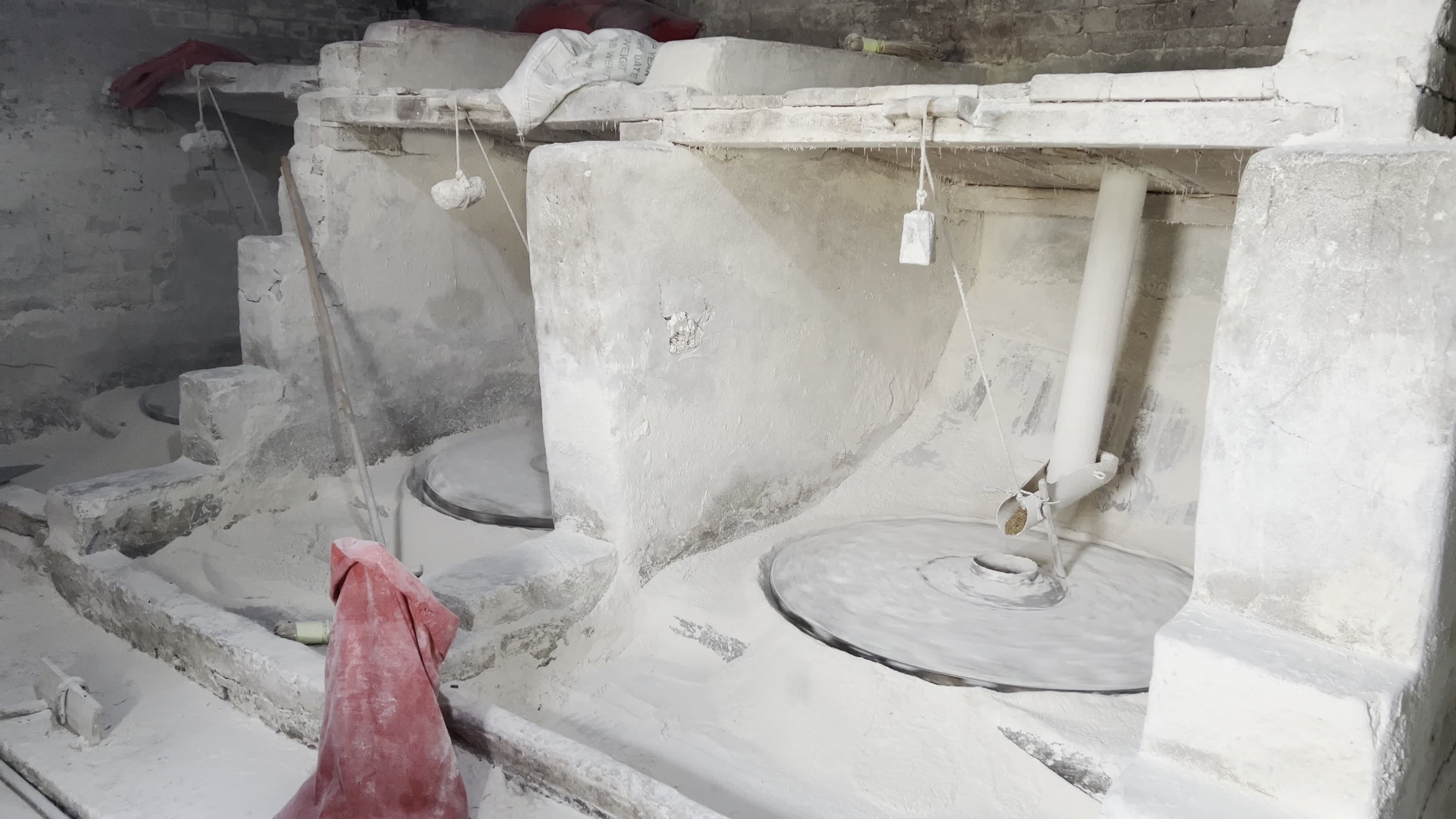 Traditional Watermill Still Turns Along Kabul River Canal in Peshawar