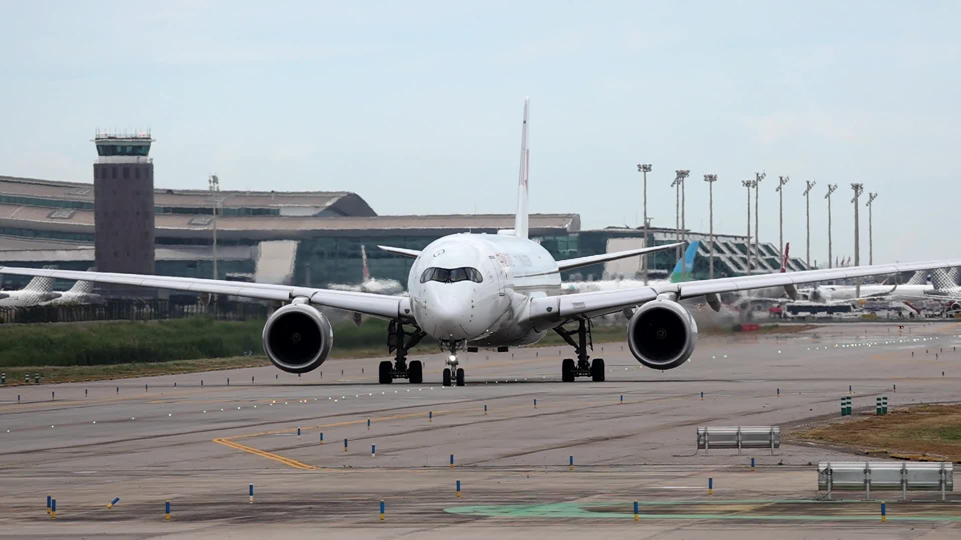 A China Eastern Airlines Airbus A350 takes off from Barcelona Airport
