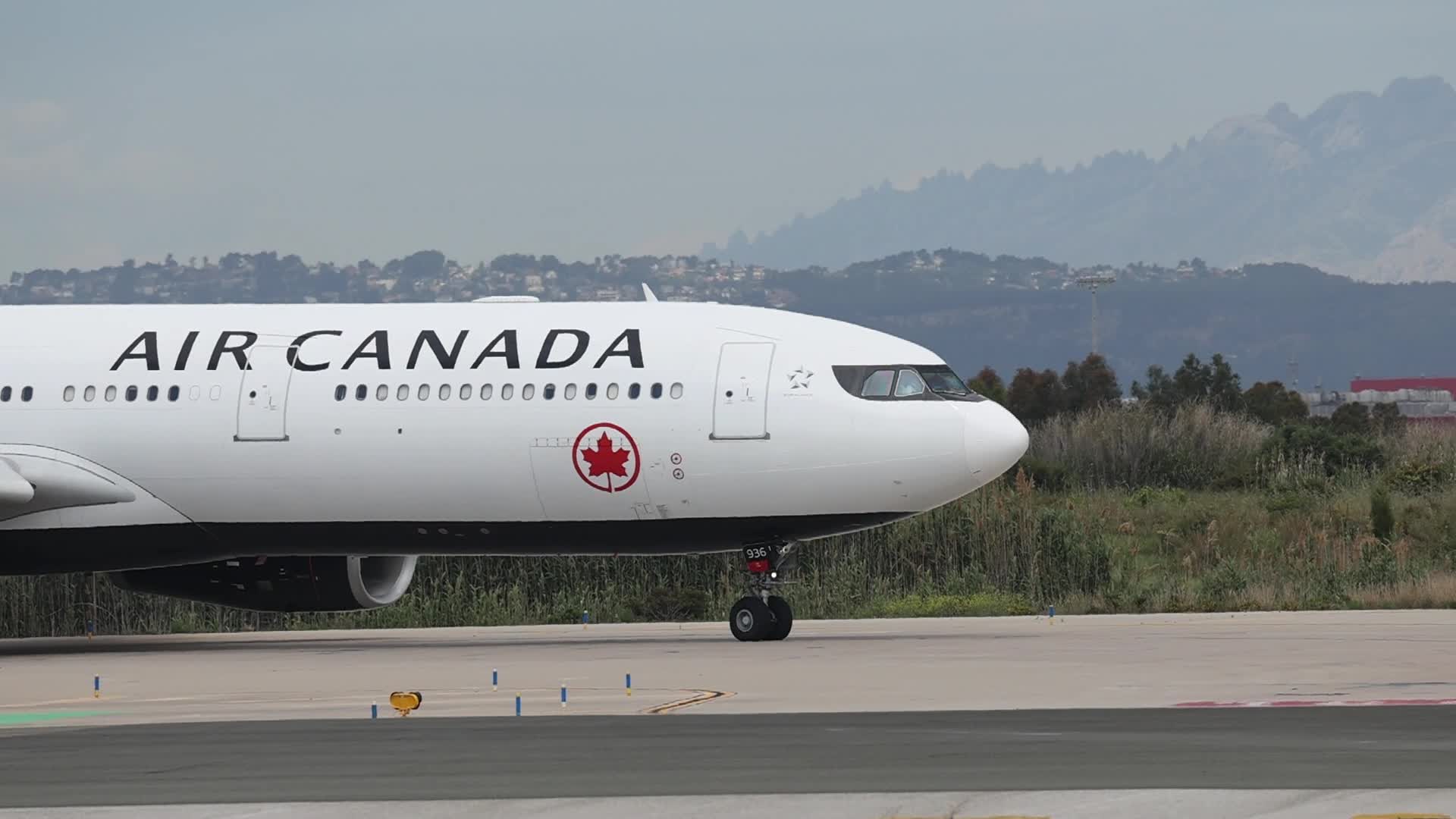 An Air Canada Airbus A330 on the runway at Barcelona Airport