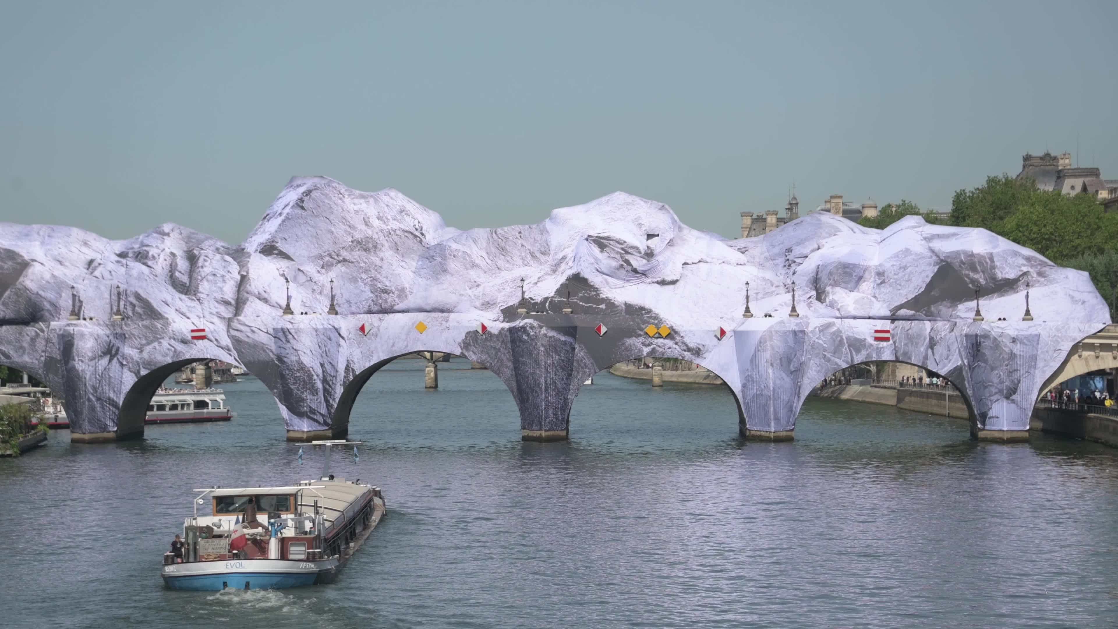 JR Unveils His New Monumental Installation "La Caverne du Pont Neuf" In Paris