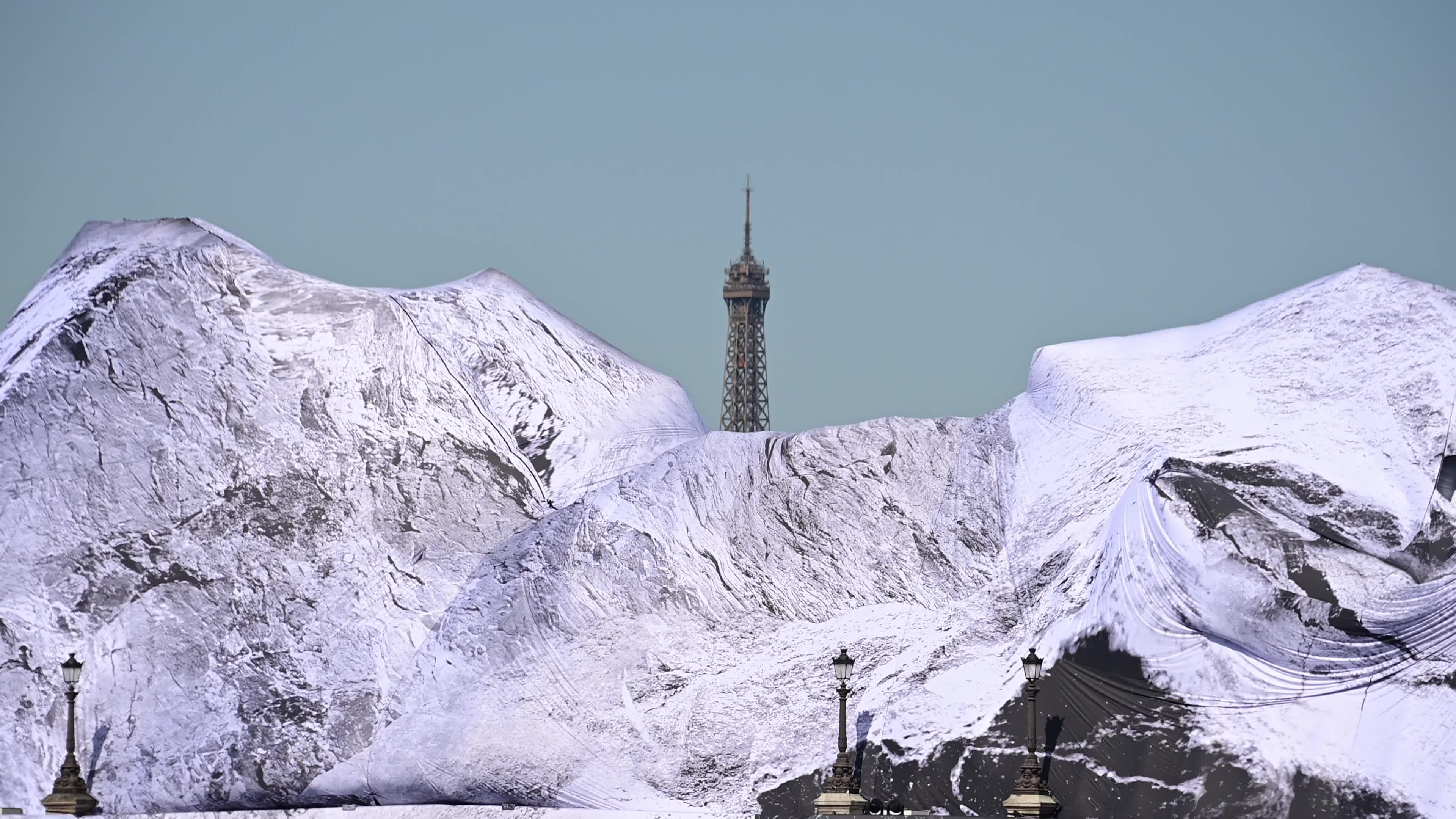 JR Unveils His New Monumental Installation "La Caverne du Pont Neuf" In Paris