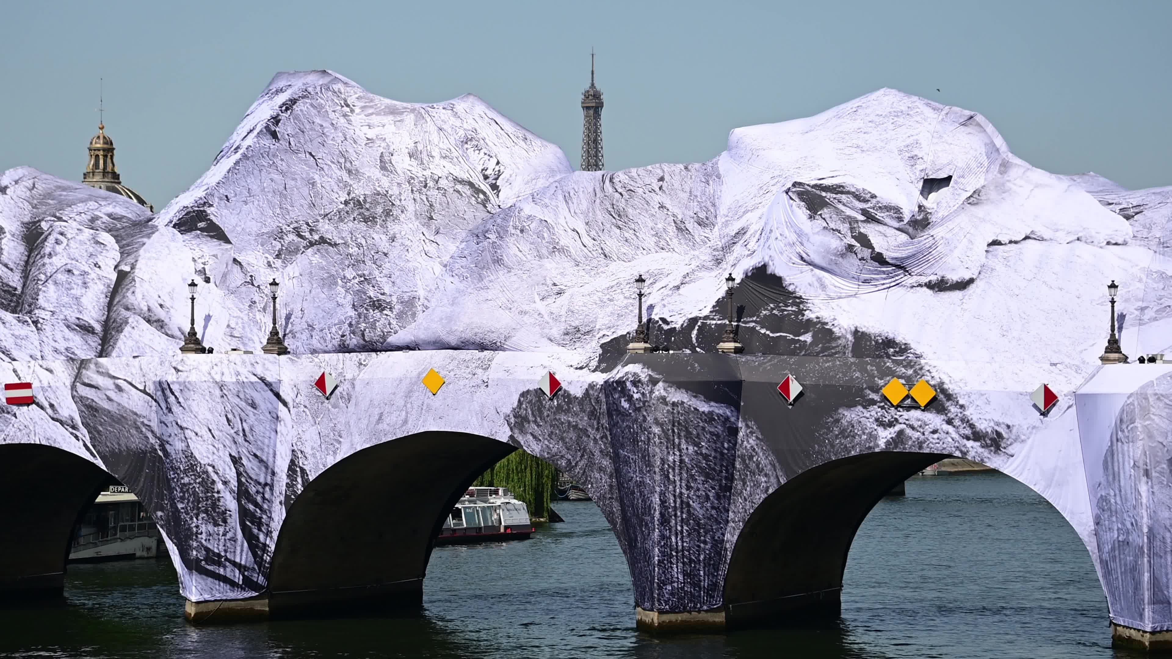 JR Unveils His New Monumental Installation "La Caverne du Pont Neuf" In Paris