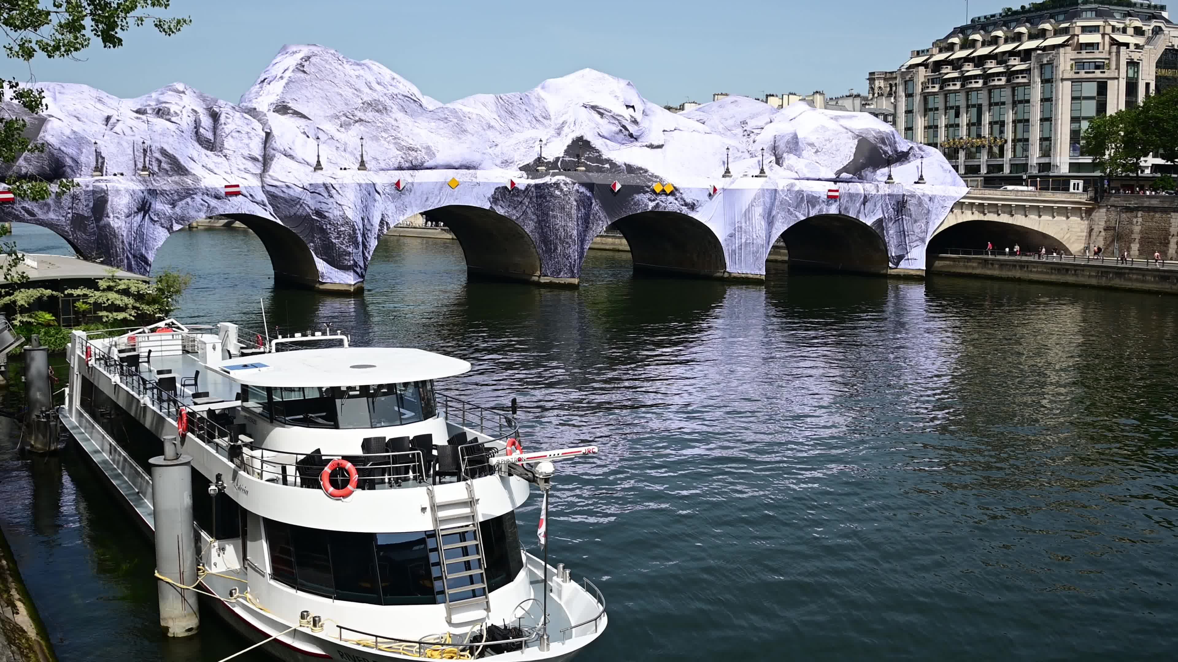 JR Unveils His New Monumental Installation "La Caverne du Pont Neuf" In Paris