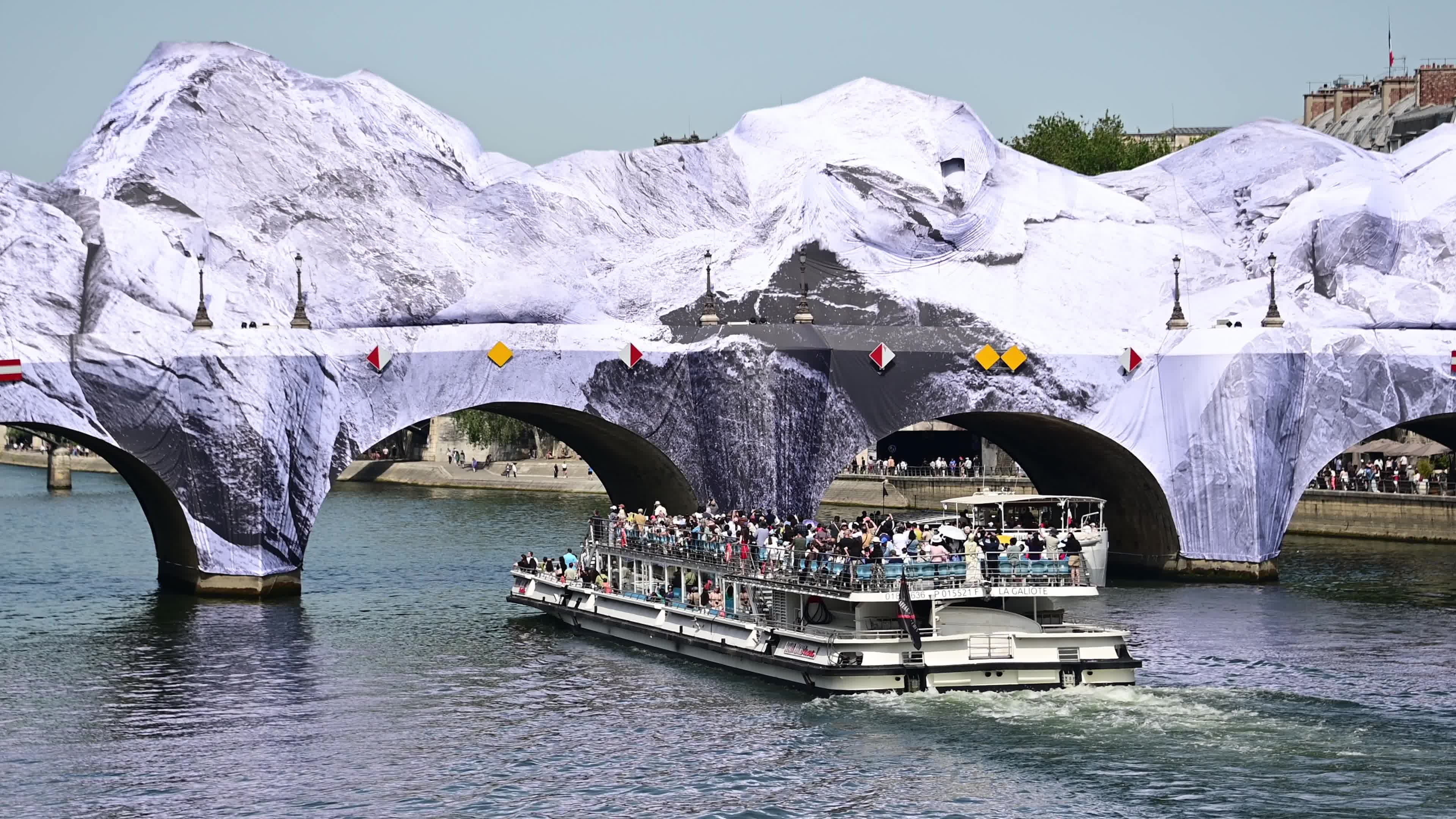 JR Unveils His New Monumental Installation "La Caverne du Pont Neuf" In Paris