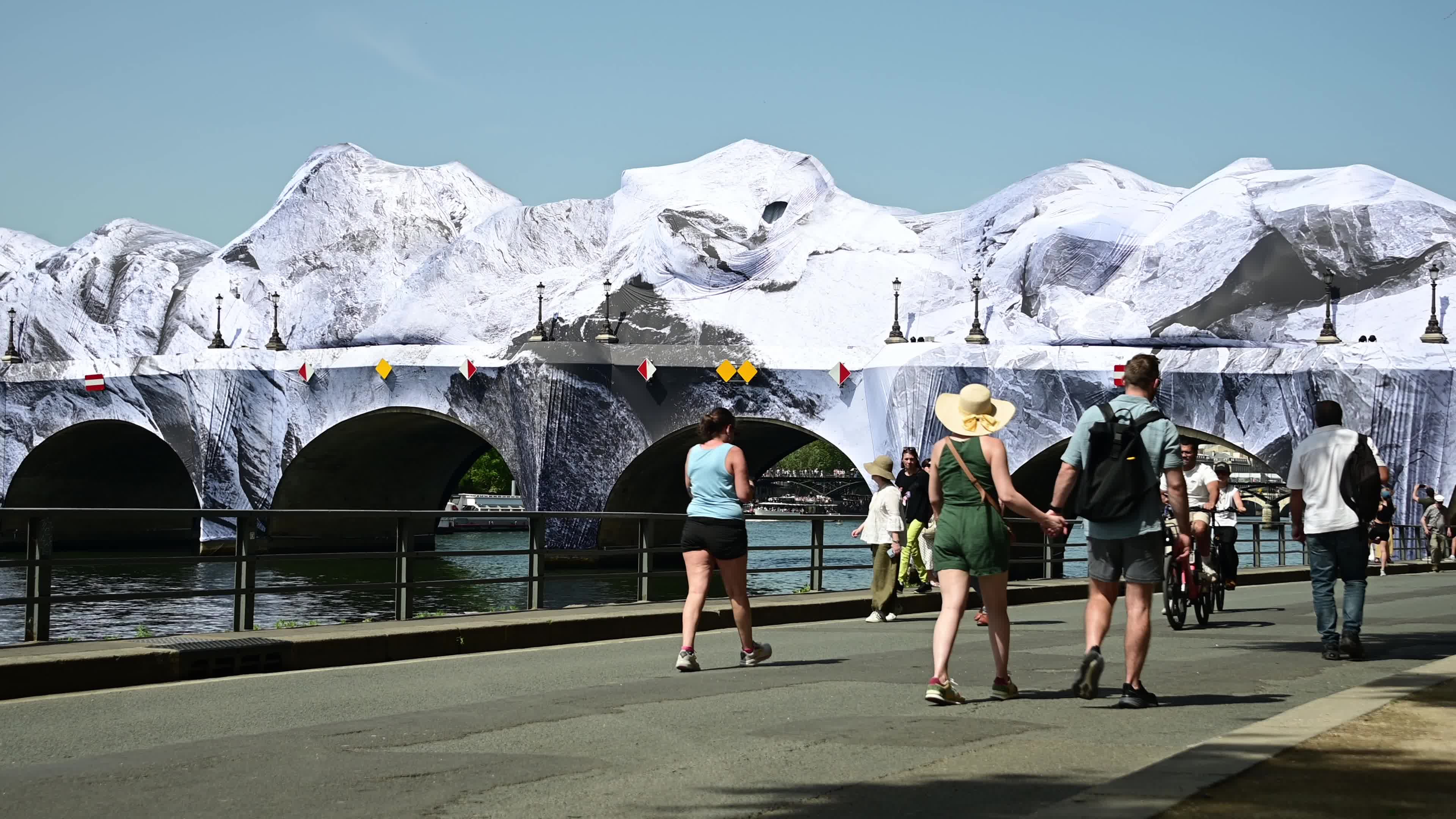 JR Unveils His New Monumental Installation "La Caverne du Pont Neuf" In Paris