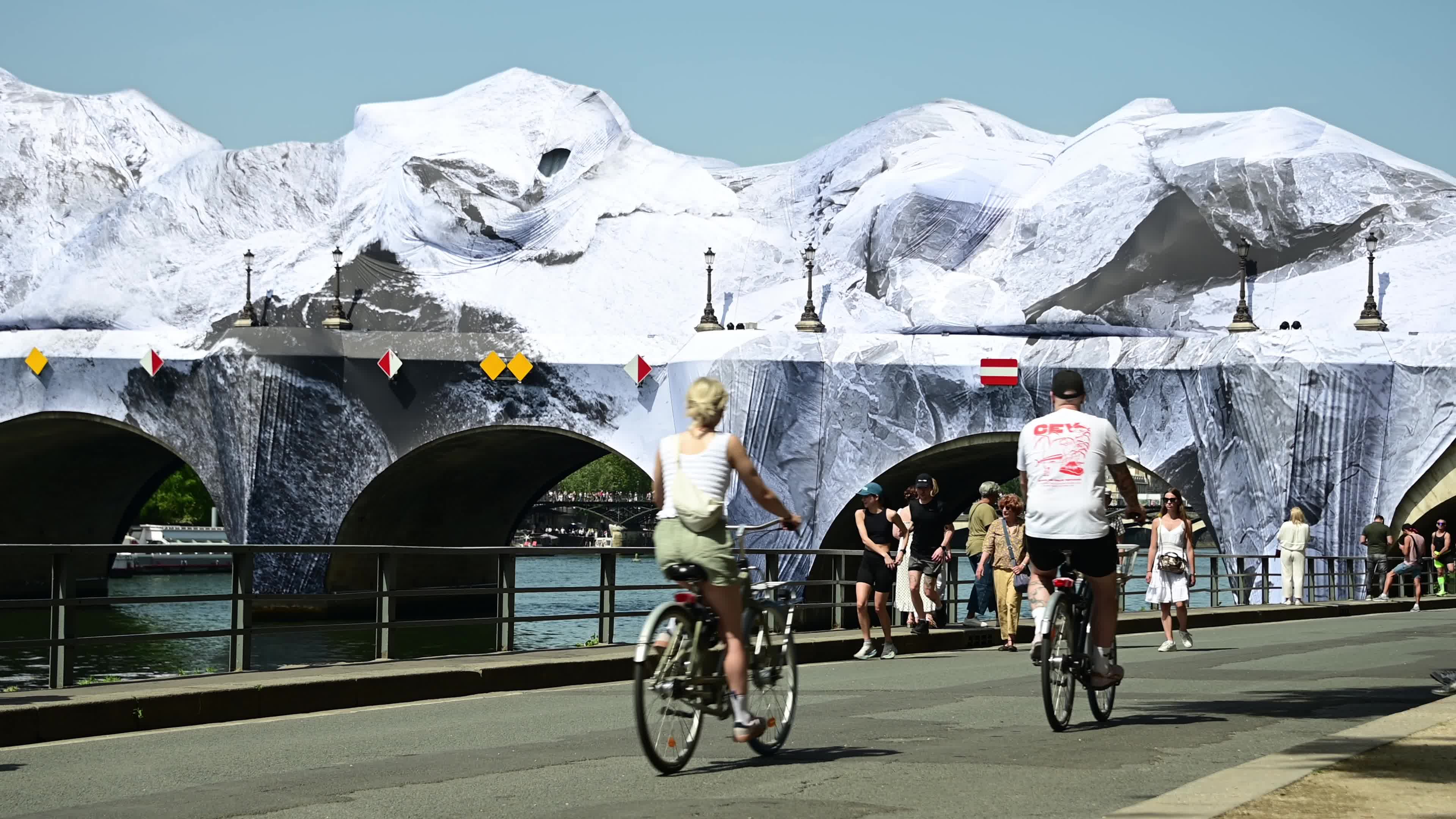 JR Unveils His New Monumental Installation "La Caverne du Pont Neuf" In Paris
