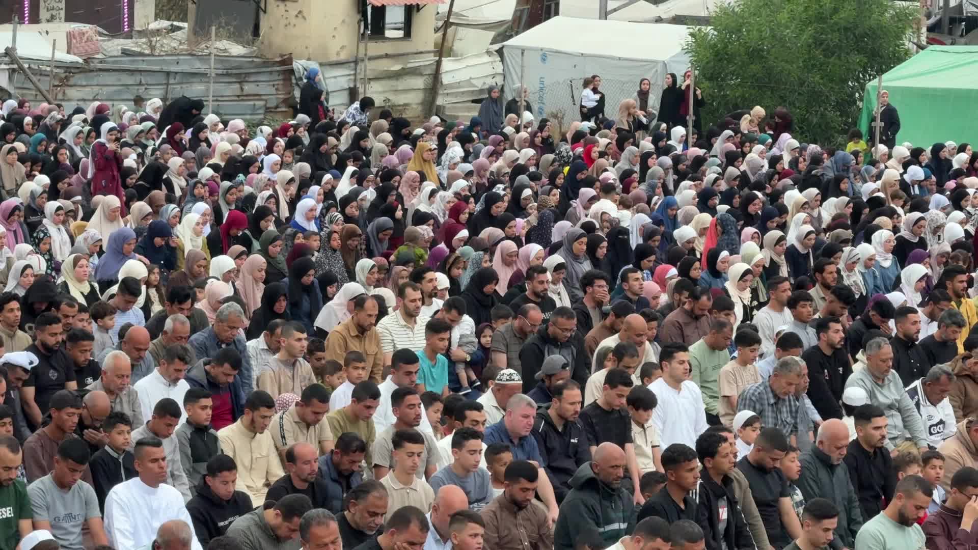 Palestinian Muslims attend the Eid al-Adha prayer, in Gaza City