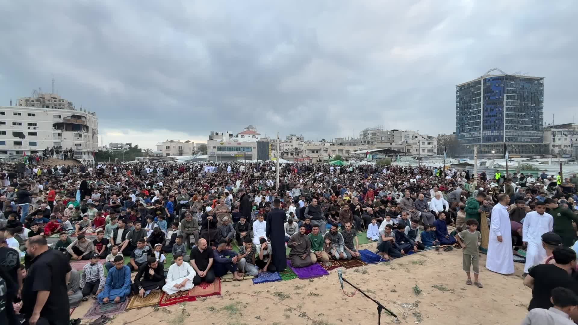 Palestinian Muslims attend the Eid al-Adha prayer, in Gaza City