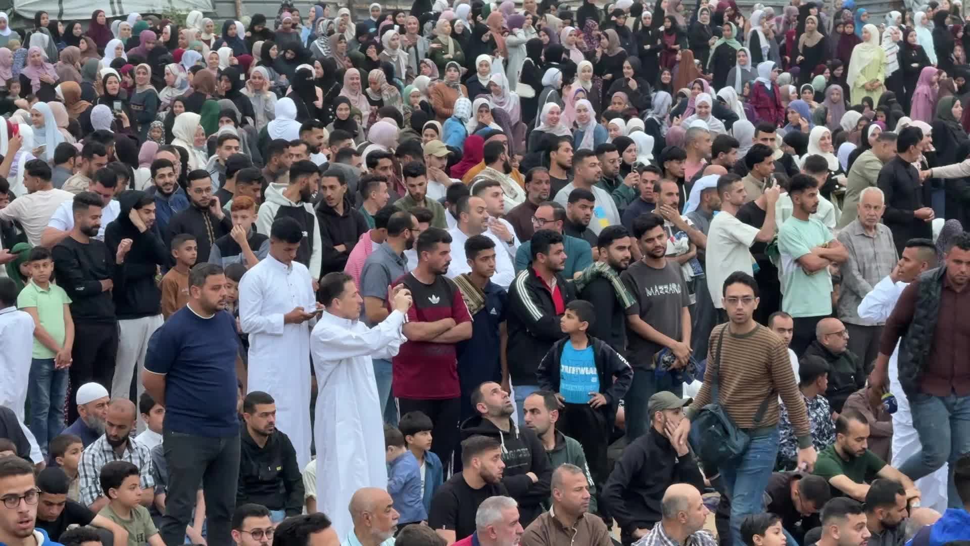 Palestinian Muslims attend the Eid al-Adha prayer, in Gaza City