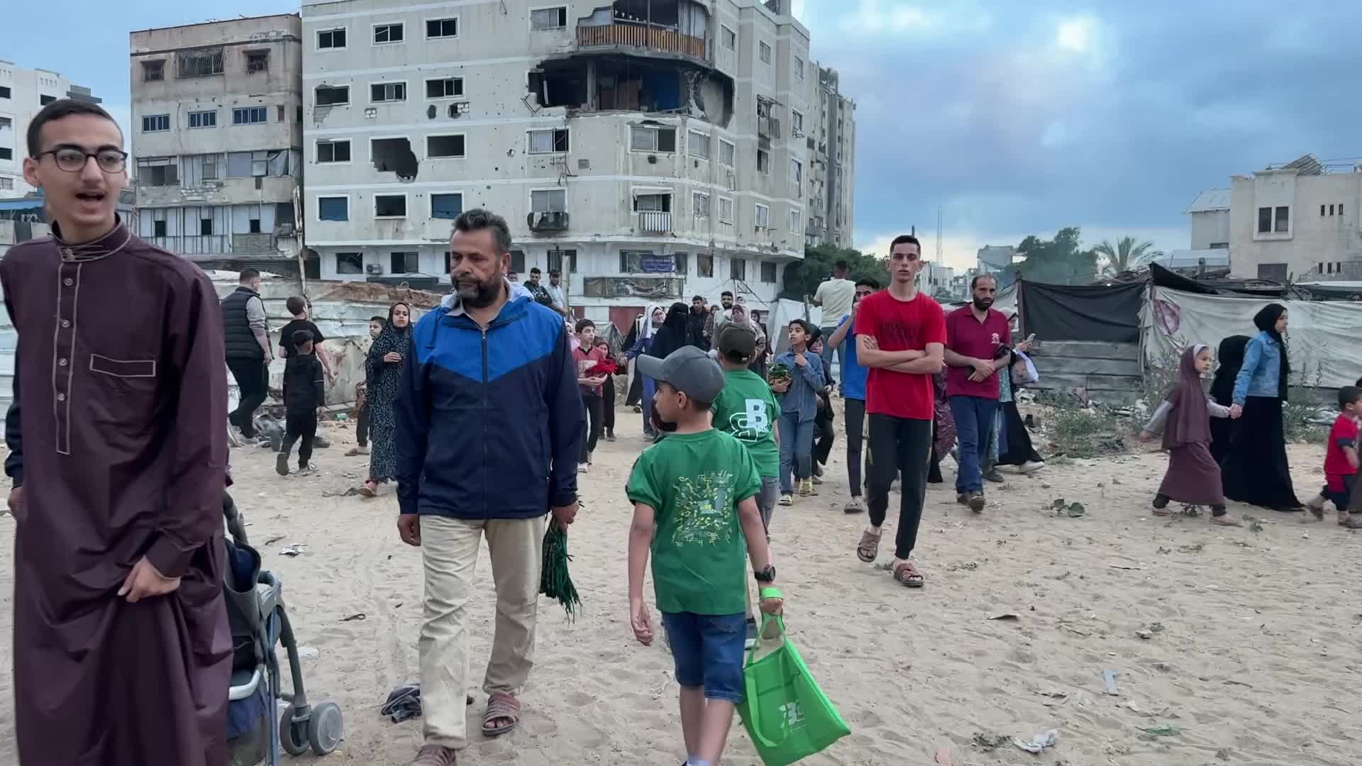 Palestinian Muslims attend the Eid al-Adha prayer, in Gaza City