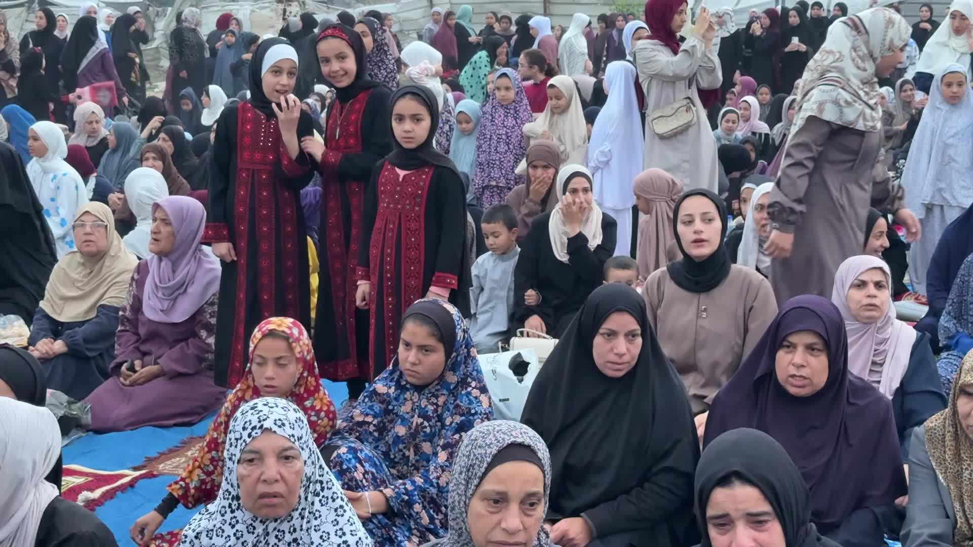 Palestinian Muslims attend the Eid al-Adha prayer, in Gaza City