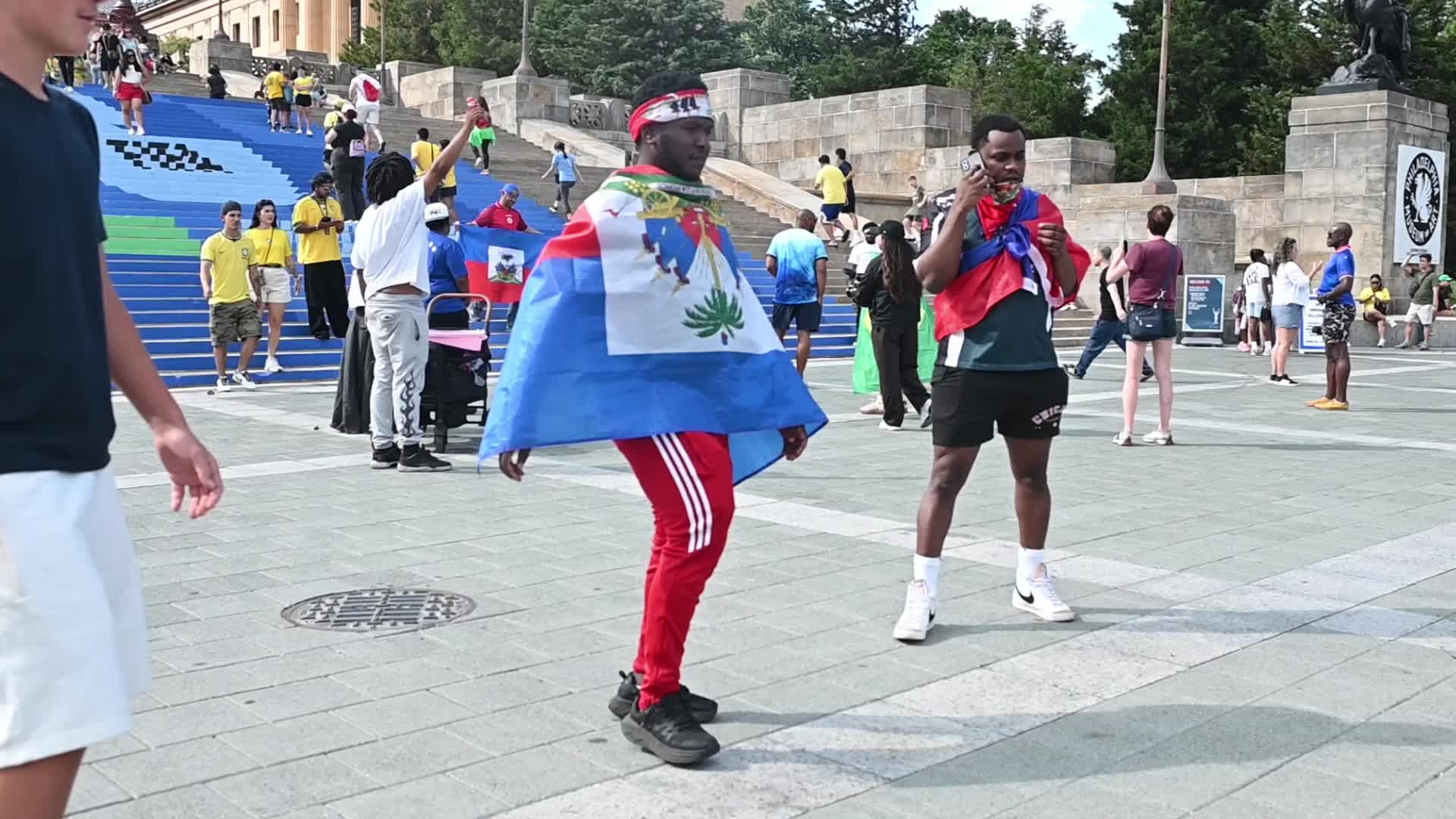 Soccer fans gather at the famous Rocky Steps in Philadelphia