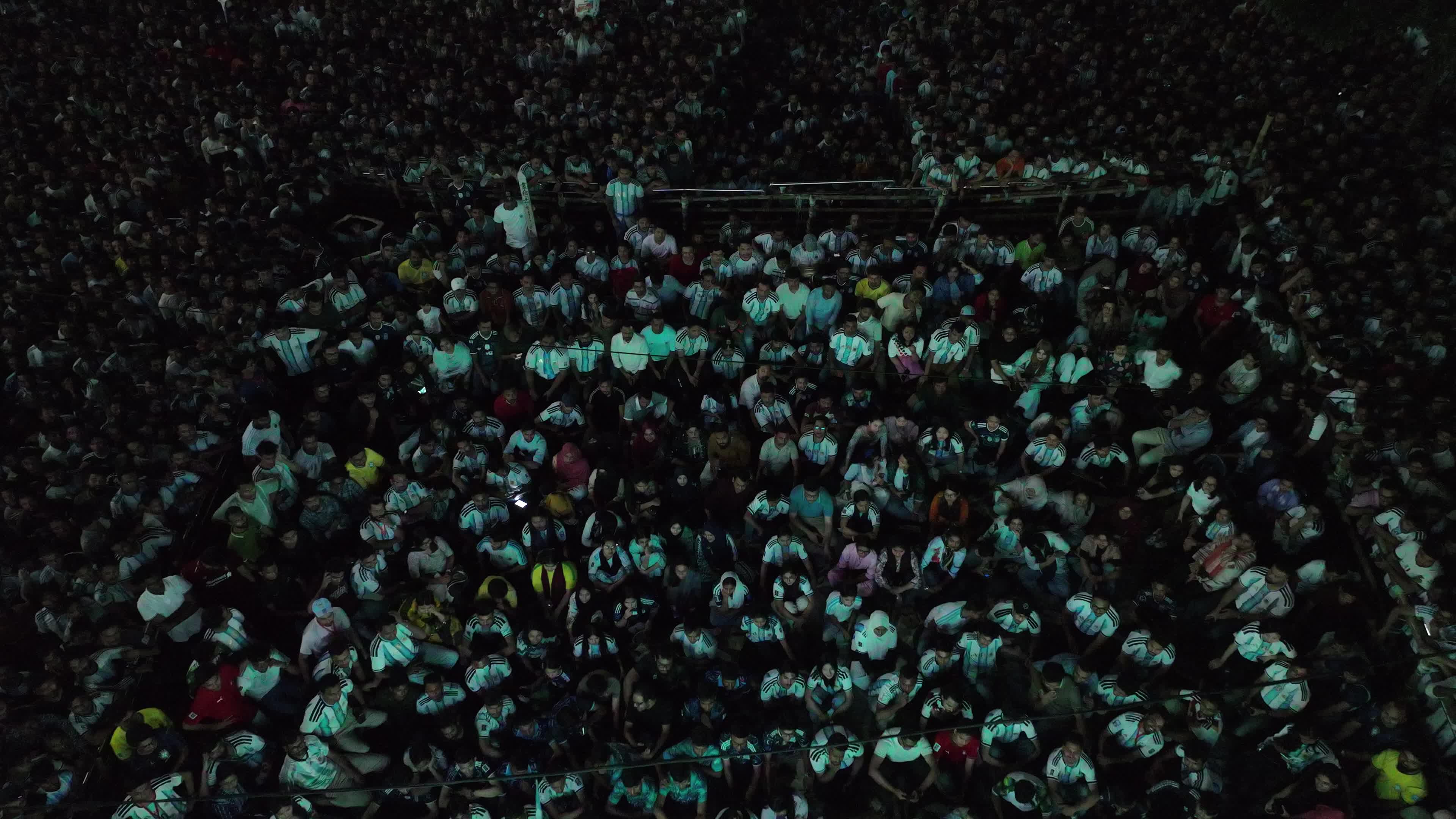 Football Fans Watch Argentina and Austria Football Match in Dhaka.