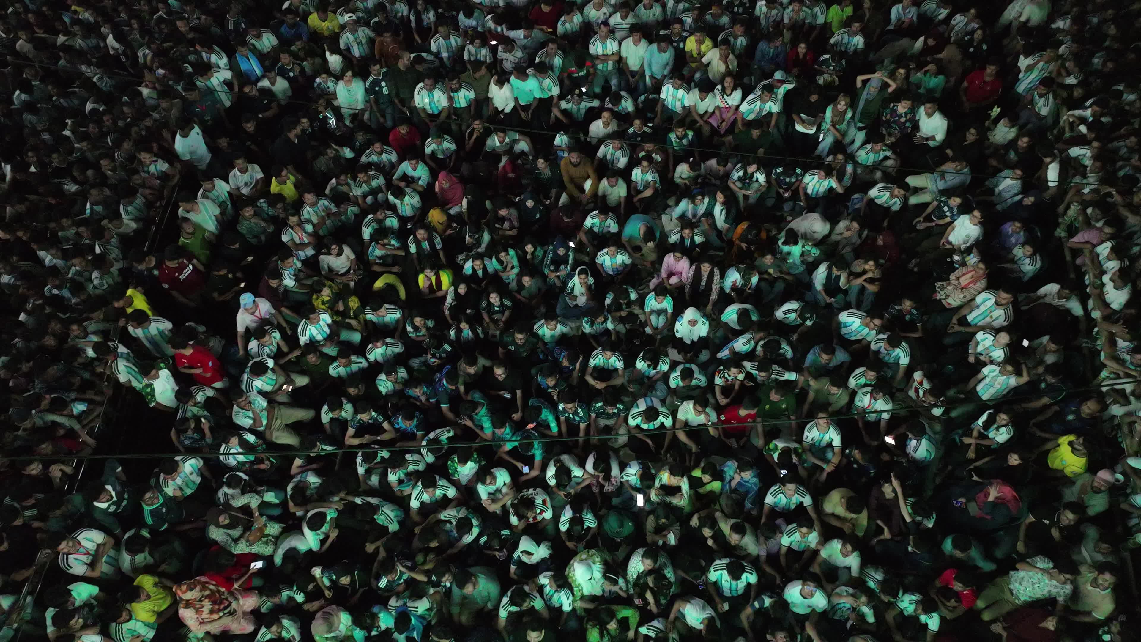 Football Fans Watch Argentina and Austria Football Match in Dhaka.