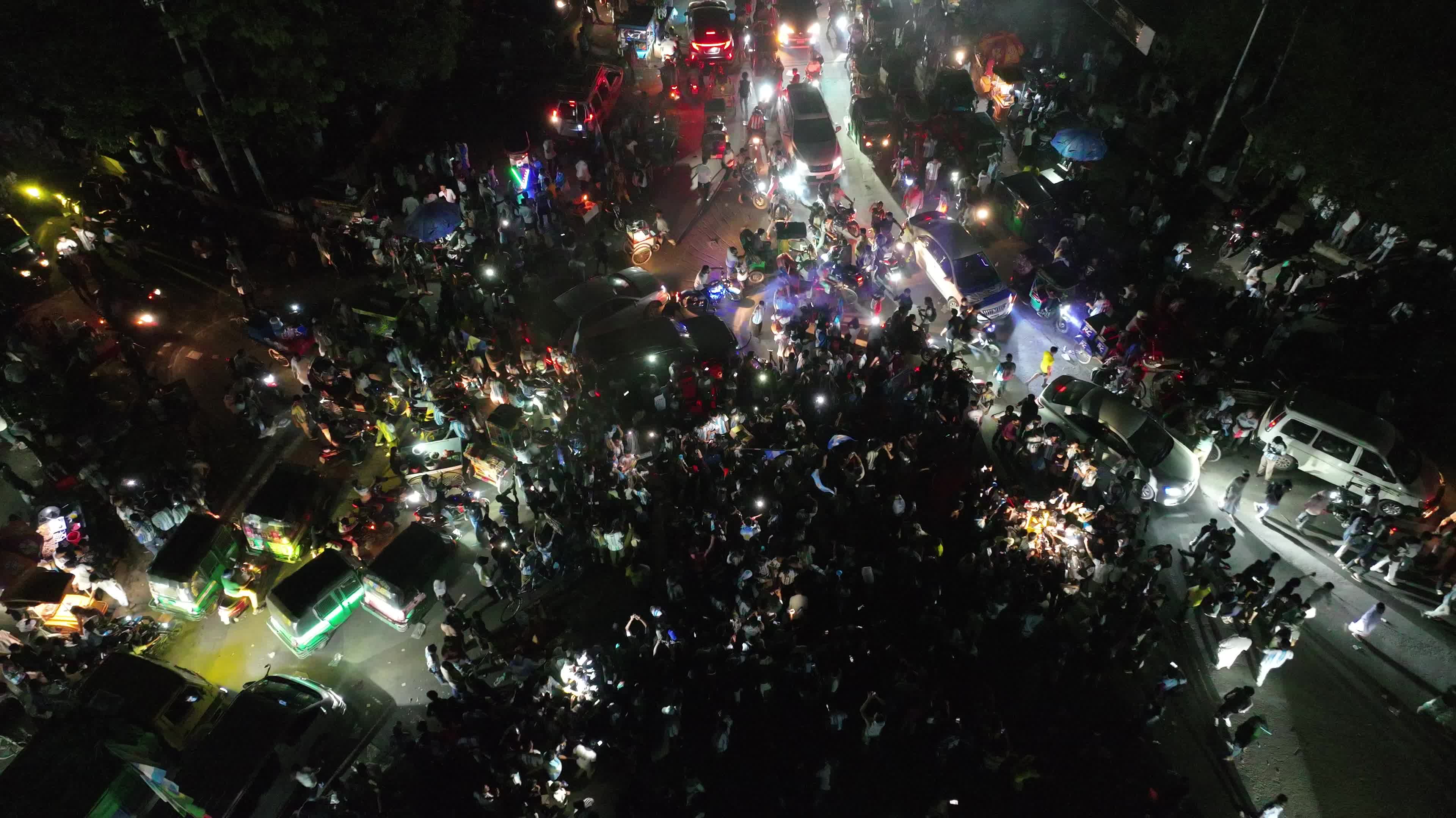 Football Fans Watch Argentina and Austria Football Match in Dhaka.