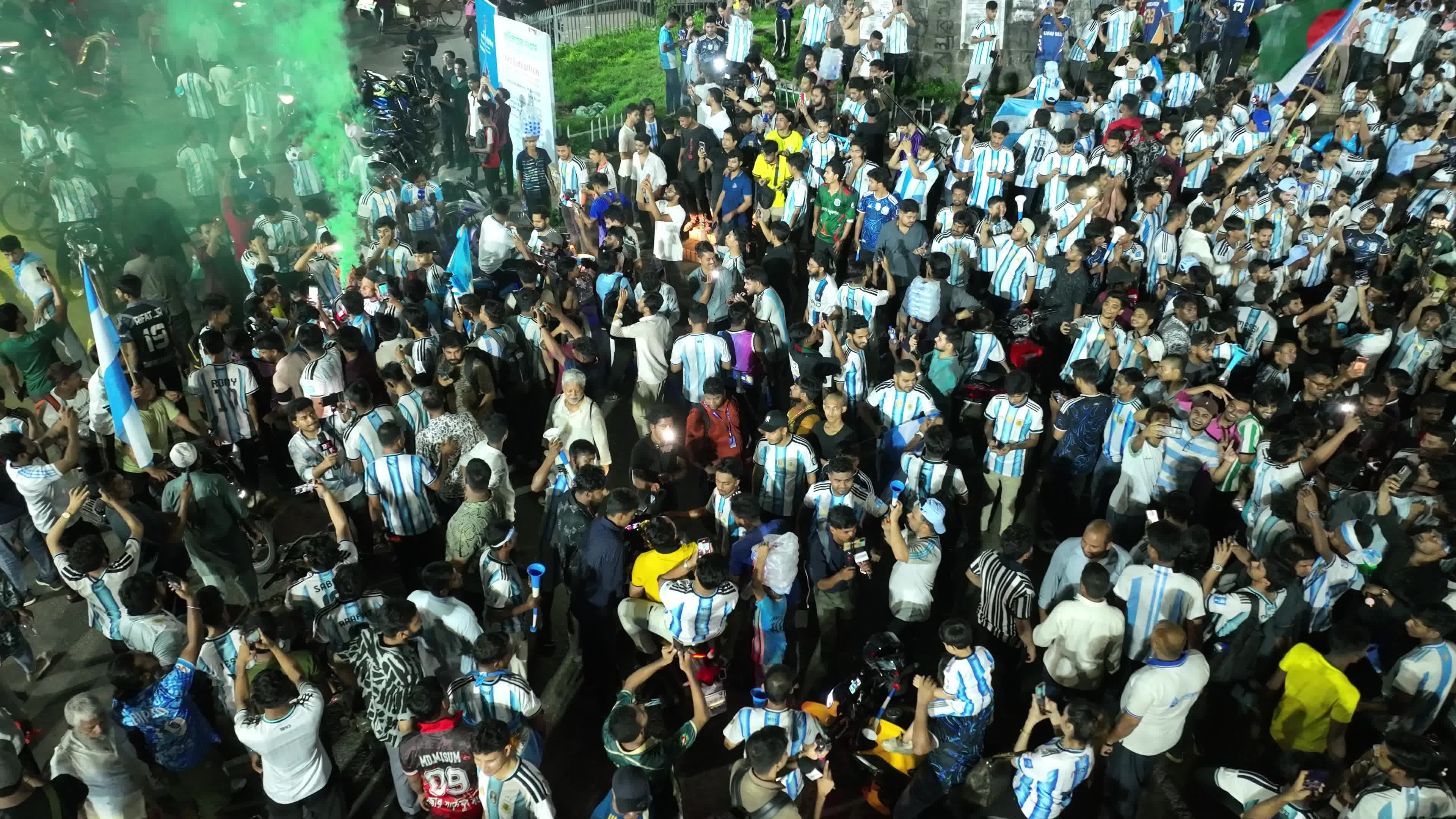 Football Fans Watch Argentina and Austria Football Match in Dhaka.