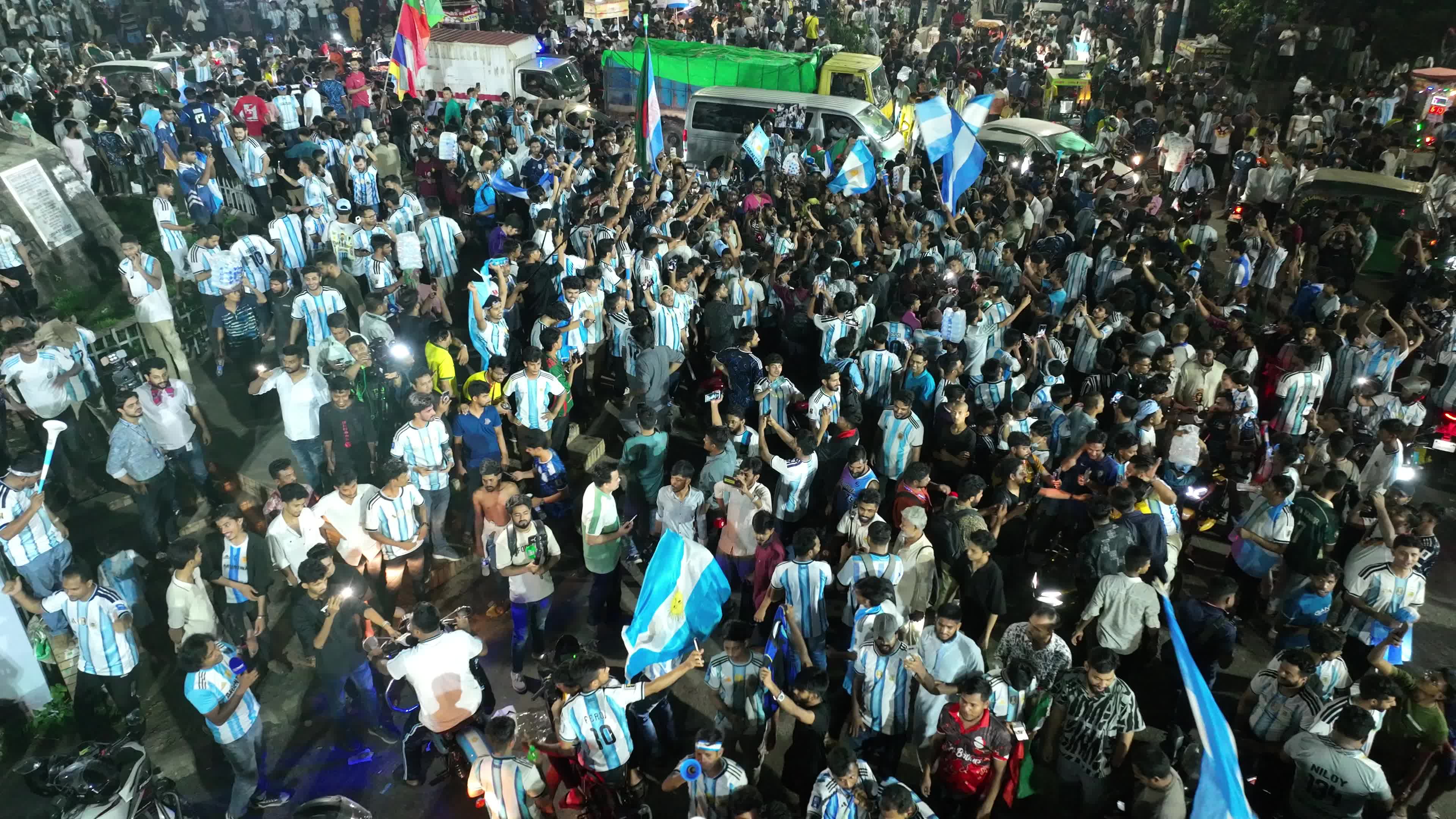 Football Fans Watch Argentina and Austria Football Match in Dhaka.