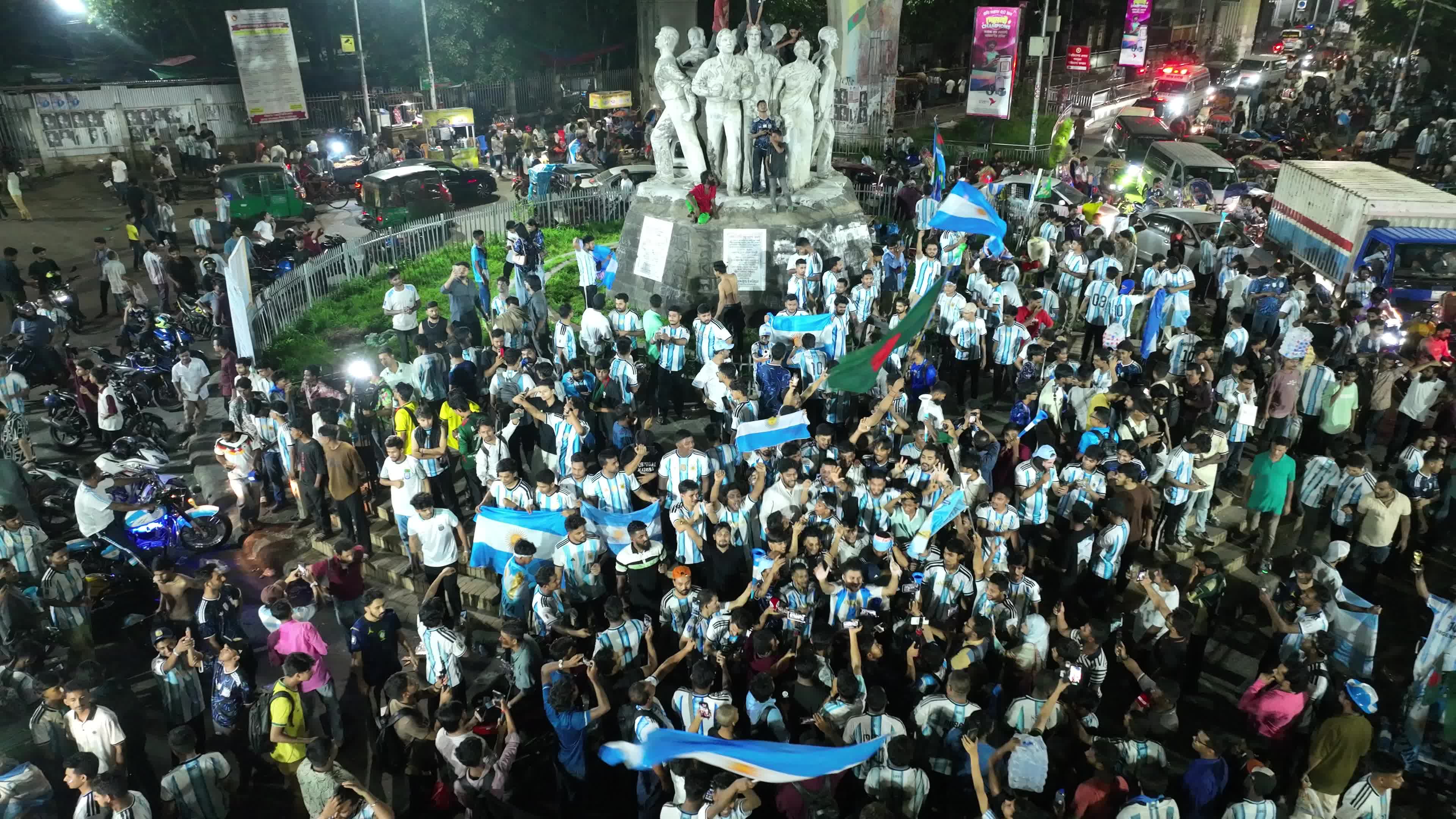 Football Fans Watch Argentina and Austria Football Match in Dhaka.