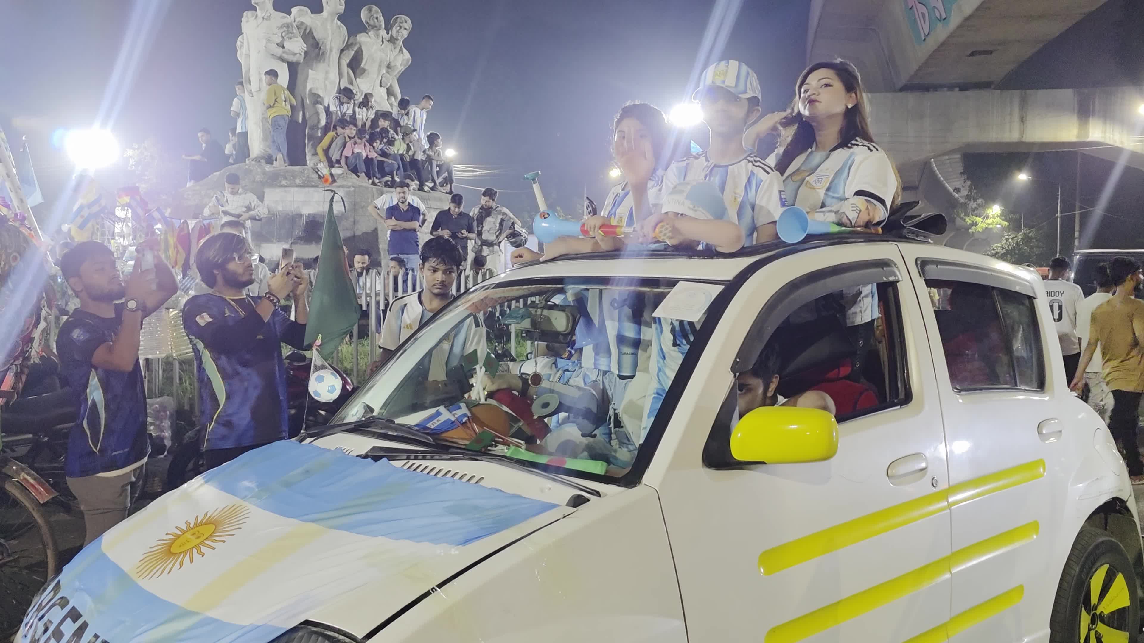 Football Fans Watch Argentina and Austria Football Match in Dhaka
