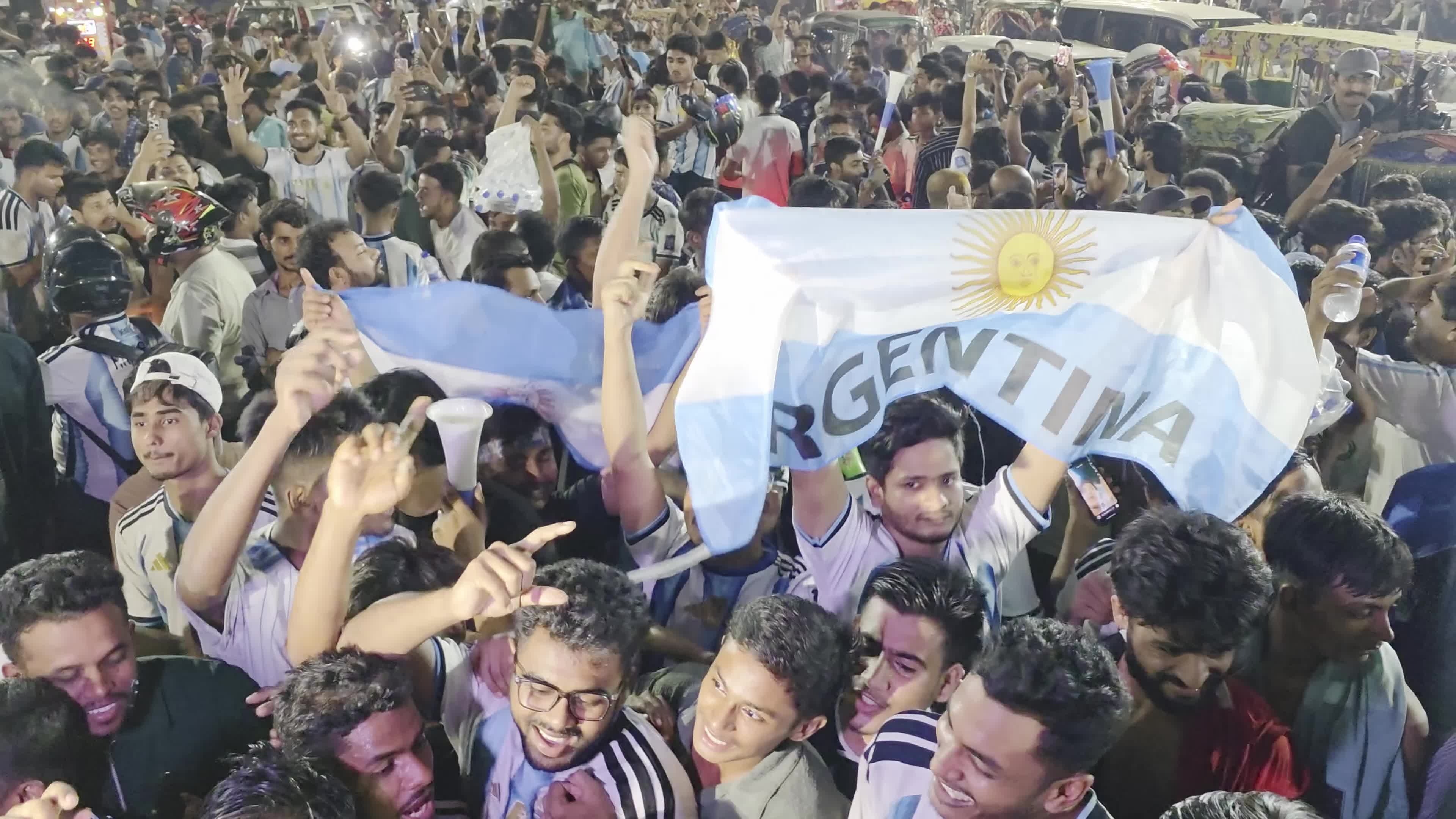 Football Fans Watch Argentina and Austria Football Match in Dhaka