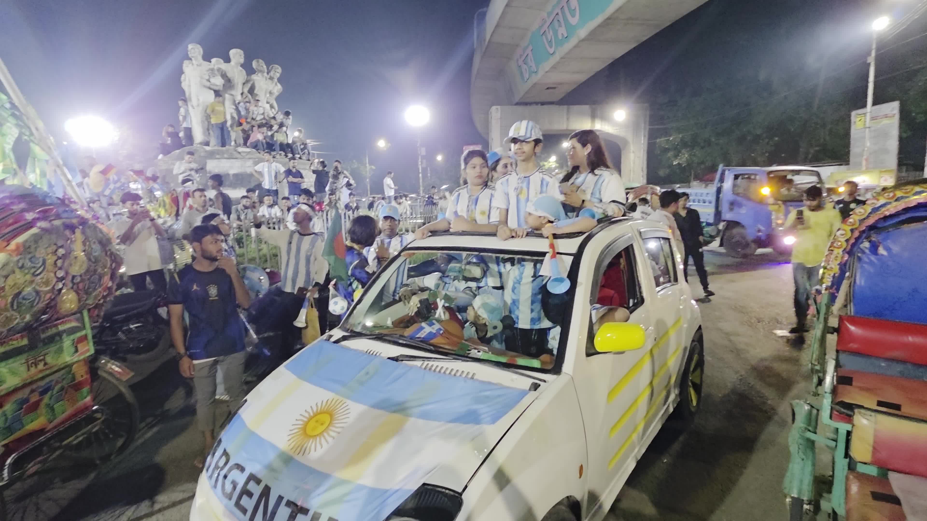 Football Fans Watch Argentina and Austria Football Match in Dhaka
