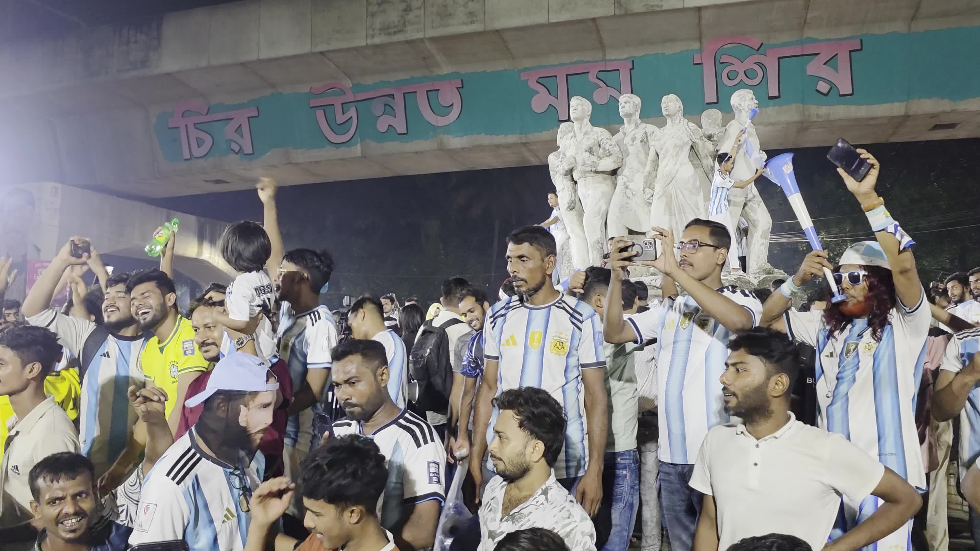 Football Fans Watch Argentina and Austria Football Match in Dhaka