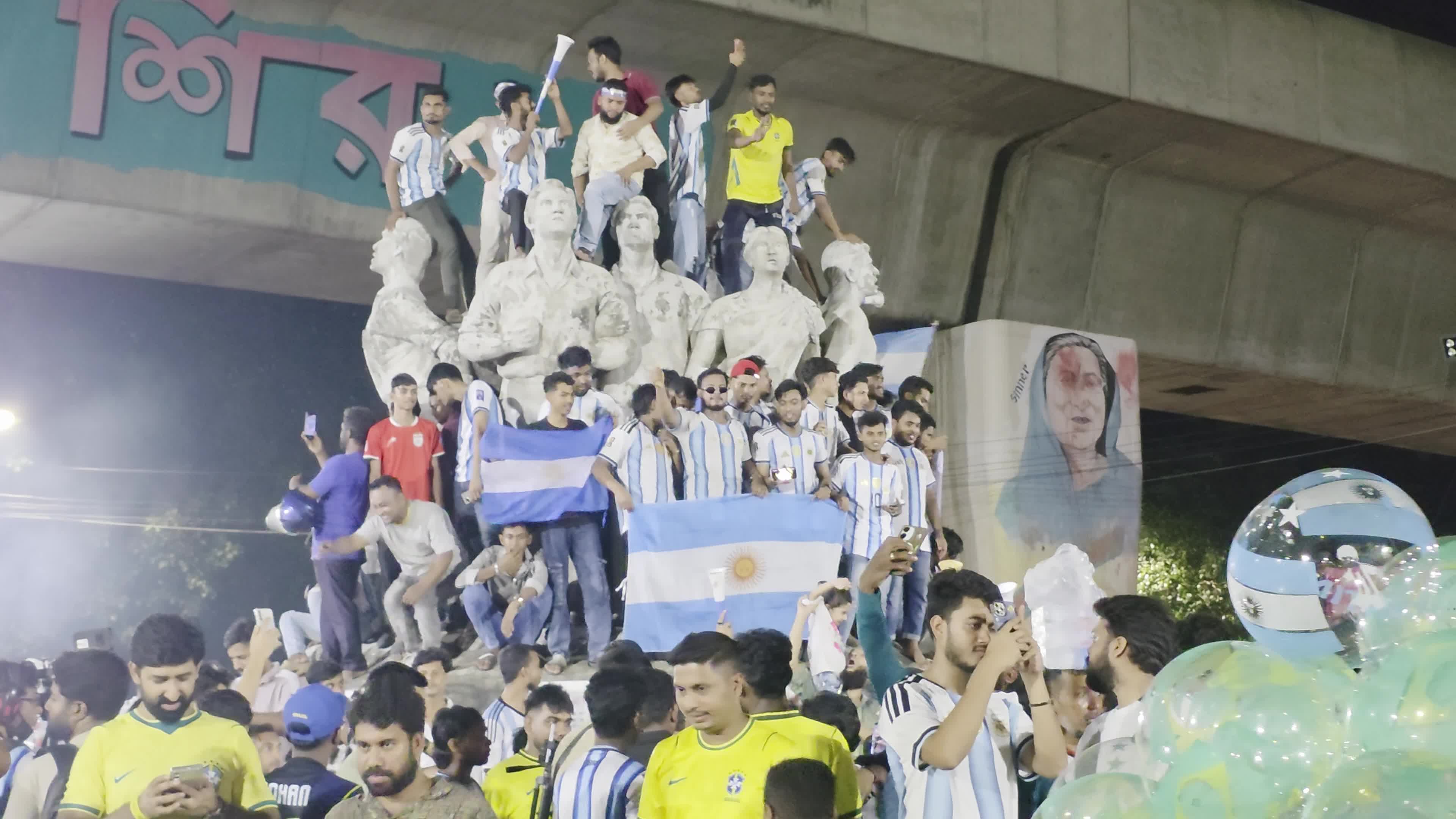 Football Fans Watch Argentina and Austria Football Match in Dhaka