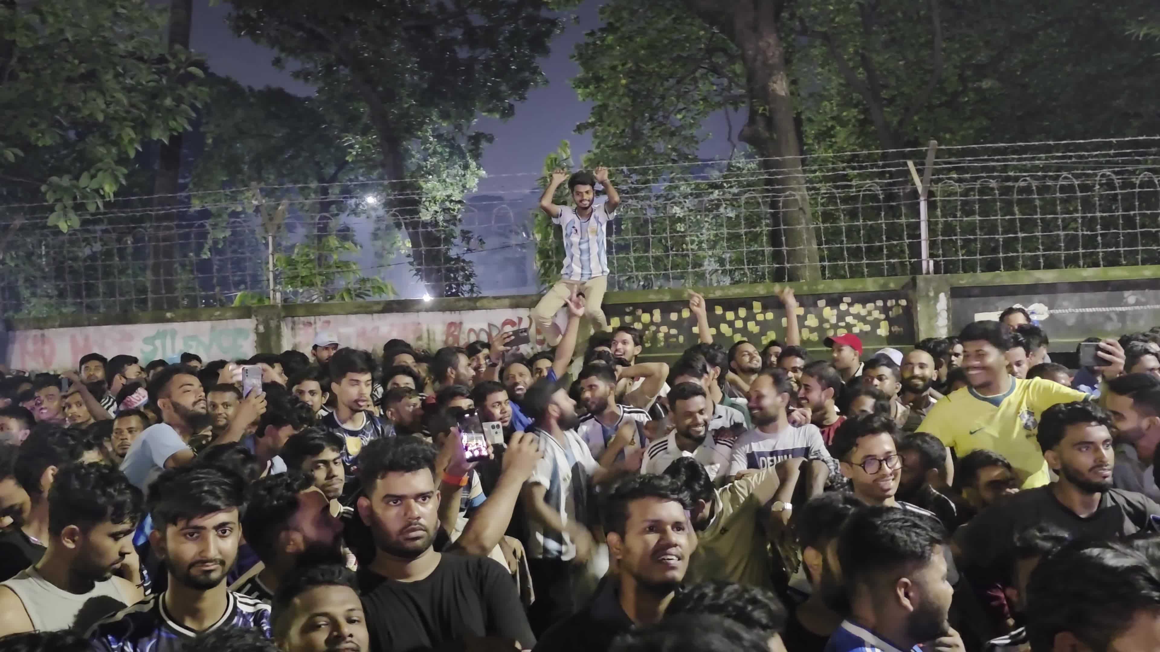 Football Fans Watch Argentina and Austria Football Match in Dhaka