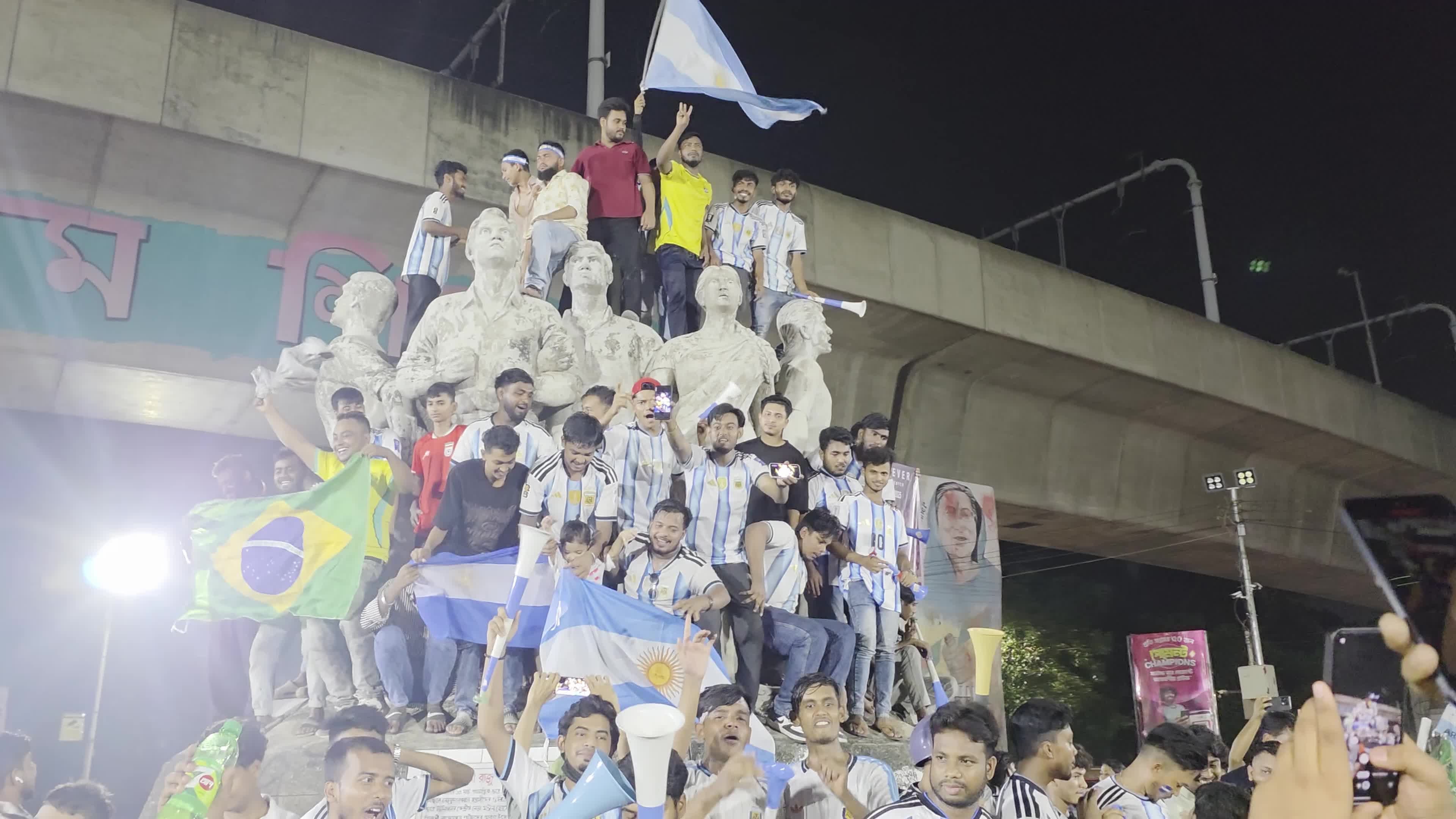 Football Fans Watch Argentina and Austria Football Match in Dhaka