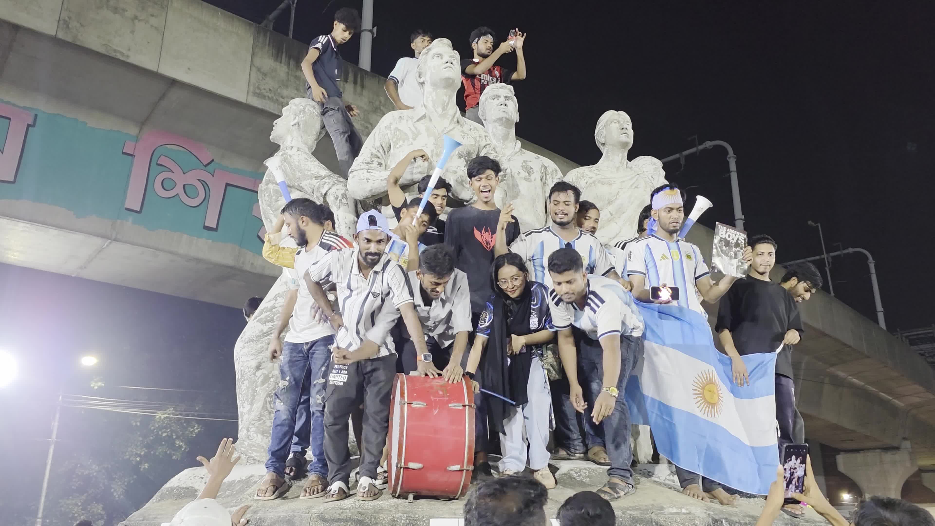 Football Fans Watch Argentina and Austria Football Match in Dhaka