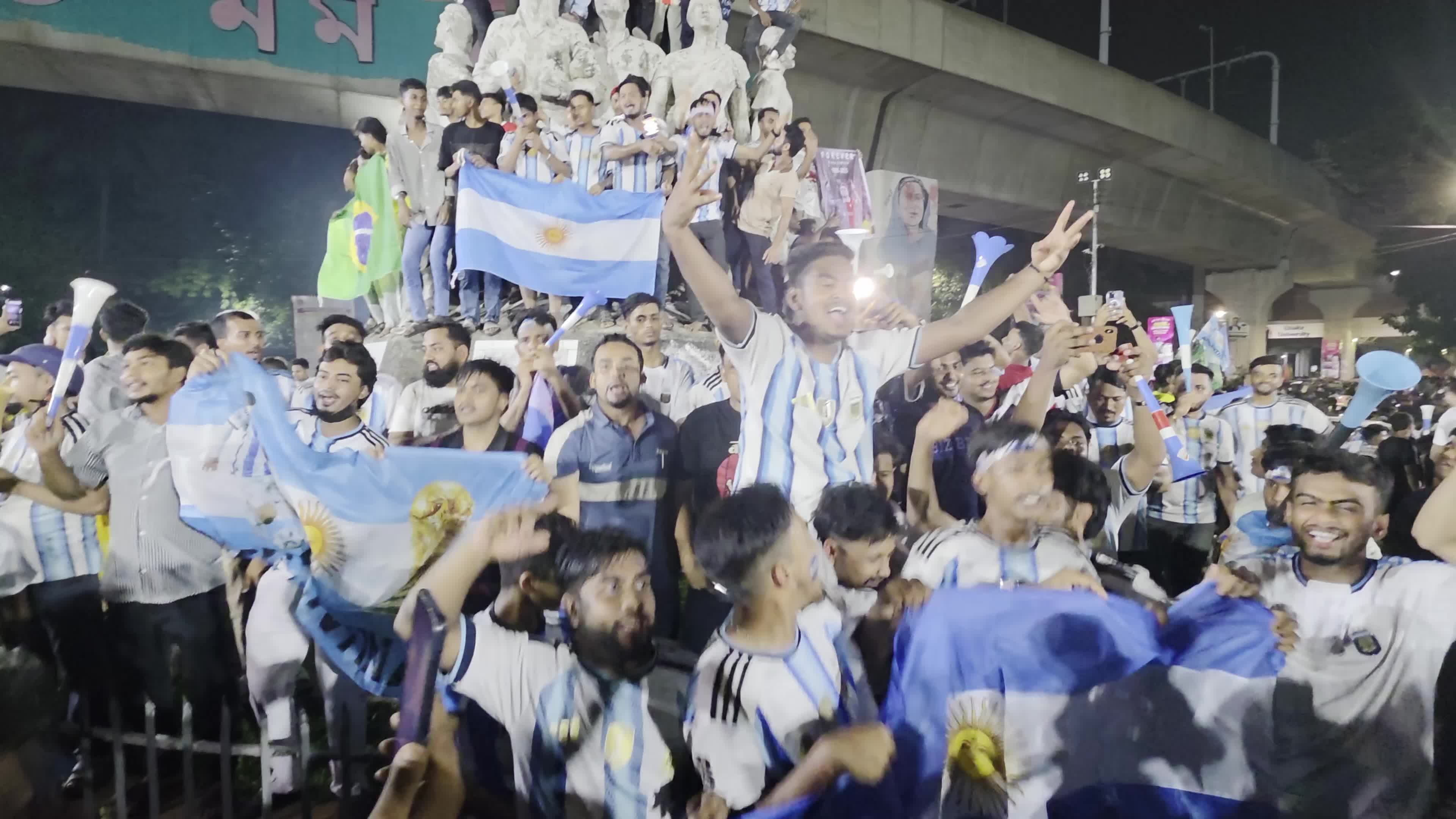 Football Fans Watch Argentina and Austria Football Match in Dhaka