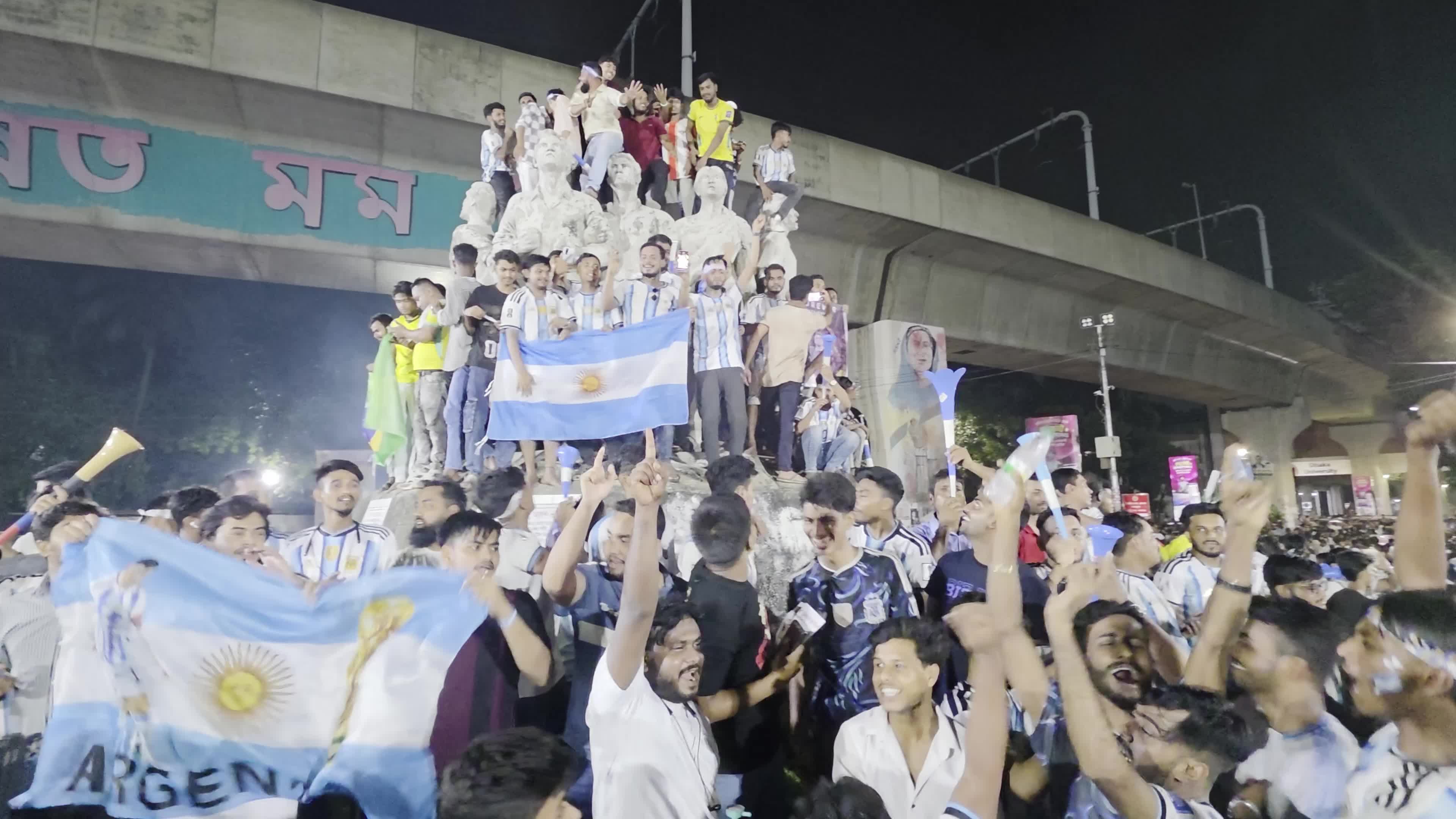 Football Fans Watch Argentina and Austria Football Match in Dhaka