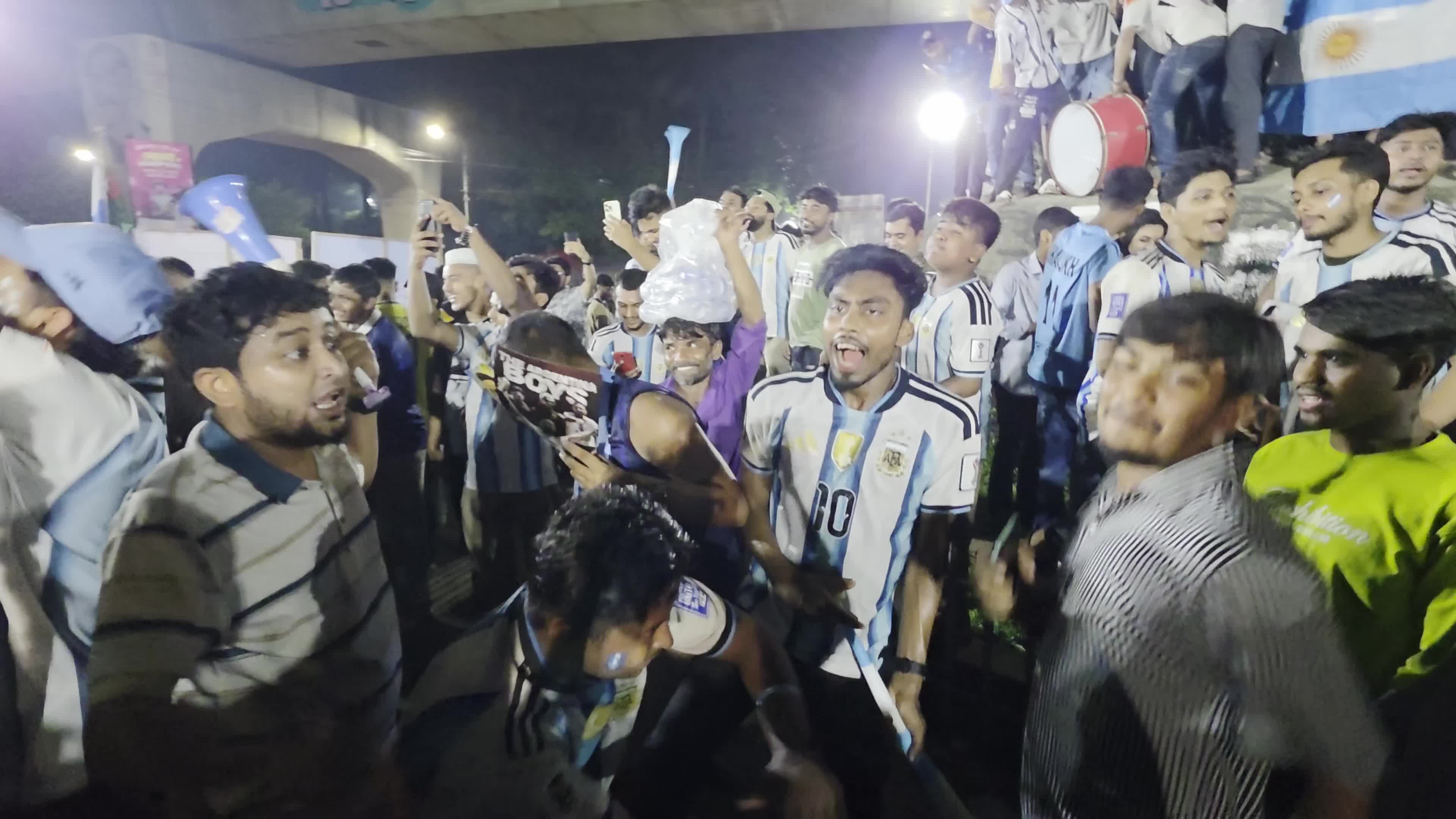 Football Fans Watch Argentina and Austria Football Match in Dhaka