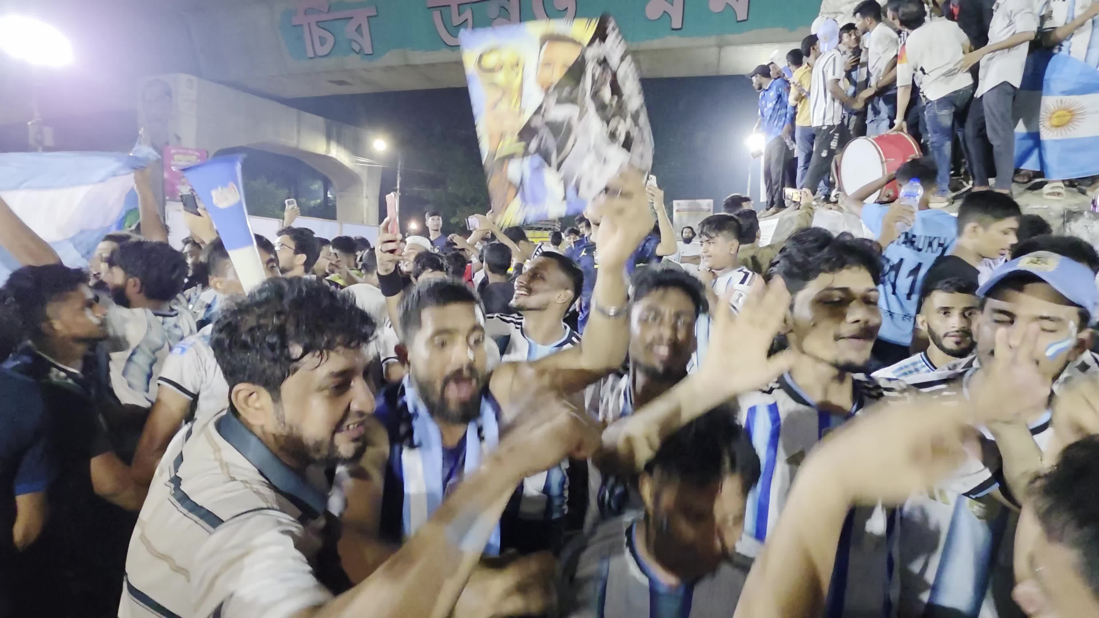 Football Fans Watch Argentina and Austria Football Match in Dhaka