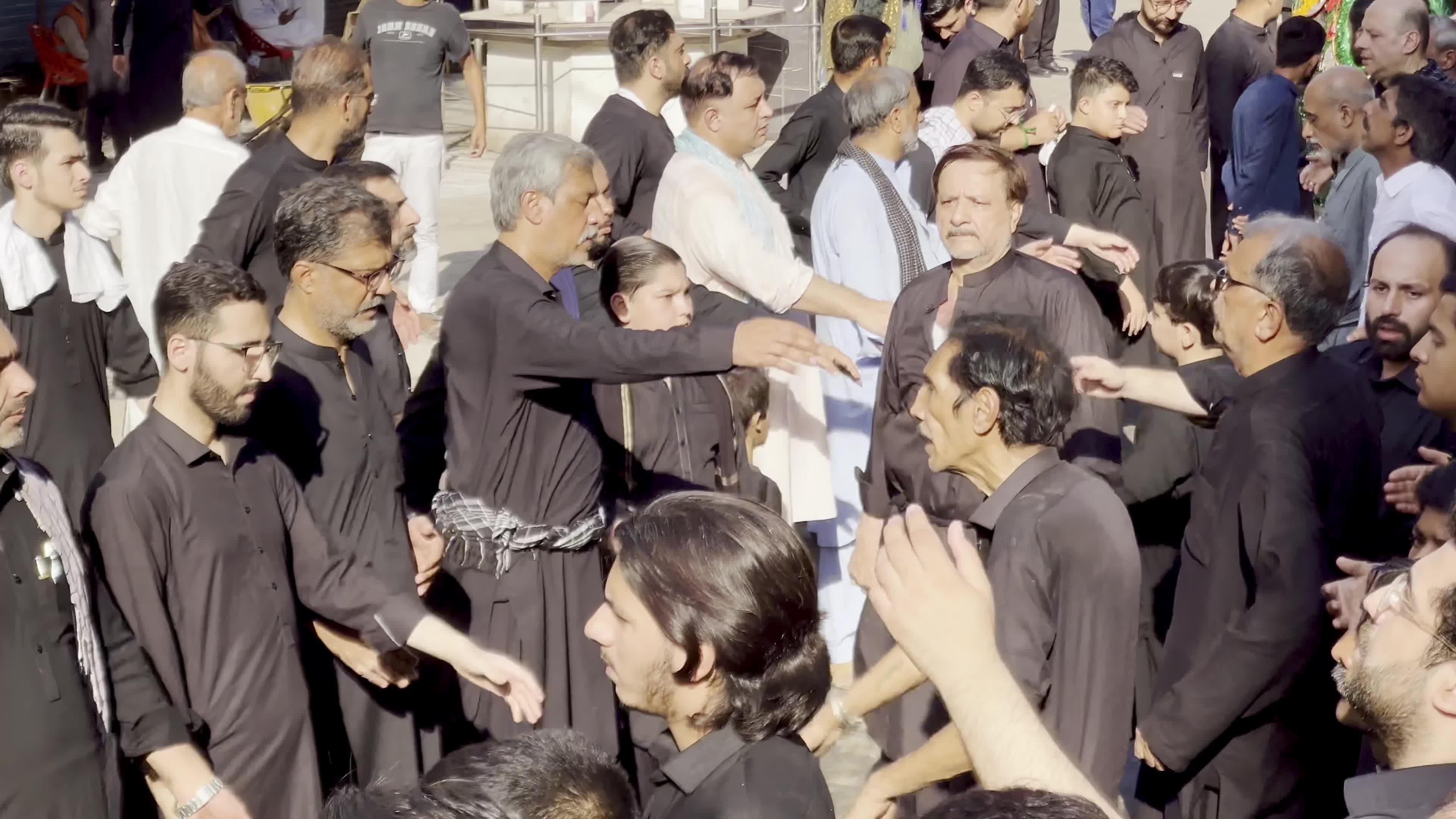 Shiite Muslim Mourners Participate in Religious Procession to Honor Imam Hussain (A.S.) and Remember the Martyrs of Karbala
